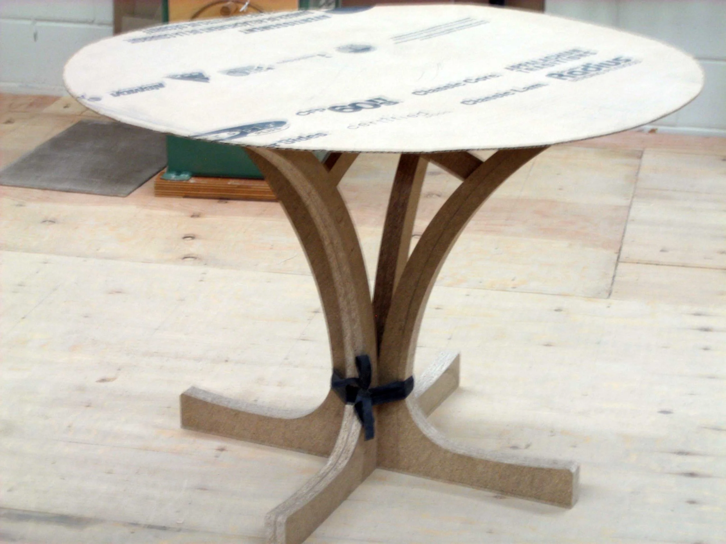 01 – A mock up for the client who has trouble making decisions using drawings alone. The legs are held together with a strip from a tire intertube.