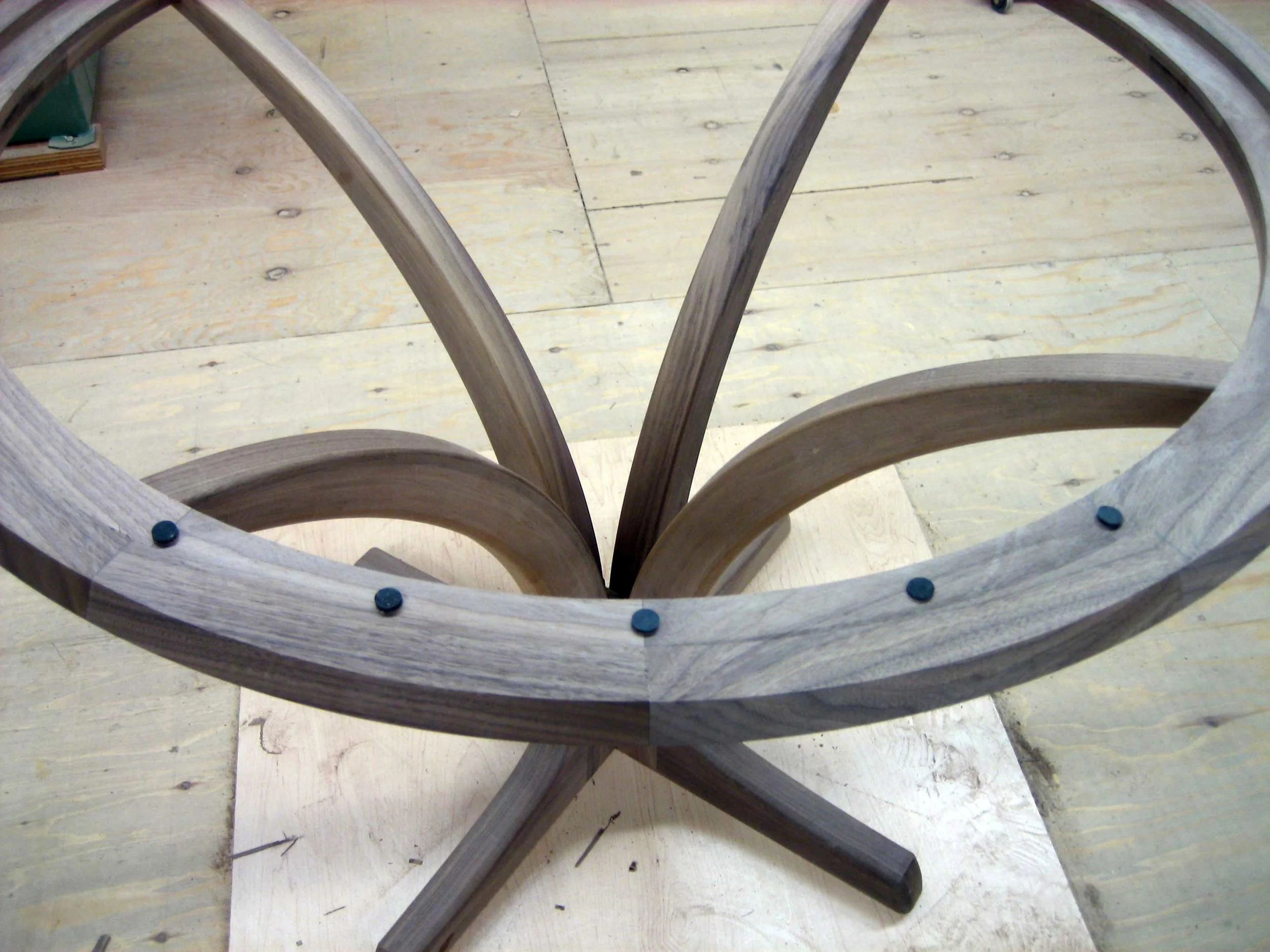 20 – Deciding on the placement of rubber pads cut with a leather punch along the rim. They will be cut into the surface.