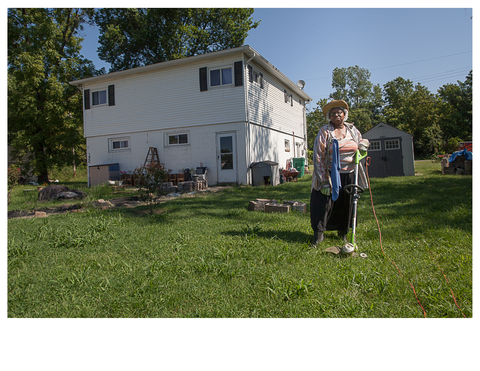 Marcella, a Street Preacher, in Her Yard, East St. Louis, IL