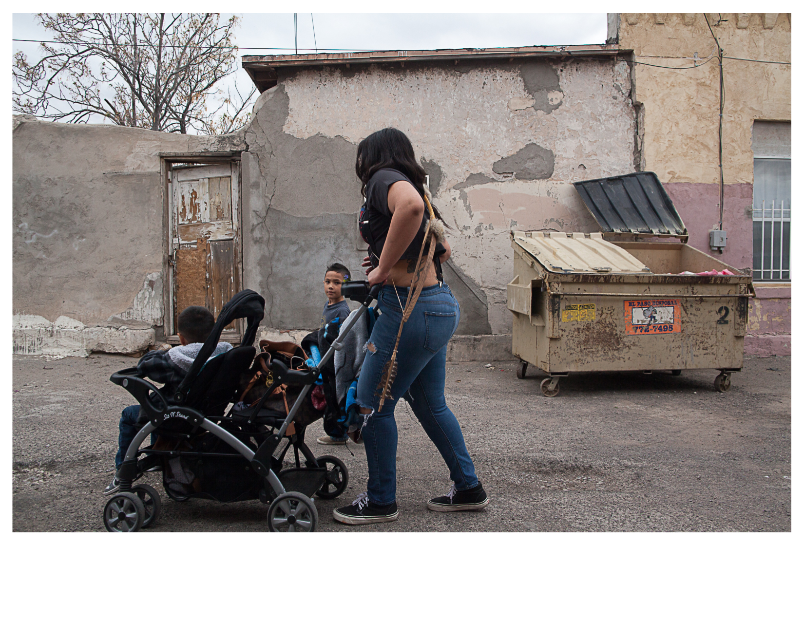 Family in Alley, El Segundo Bario, TX