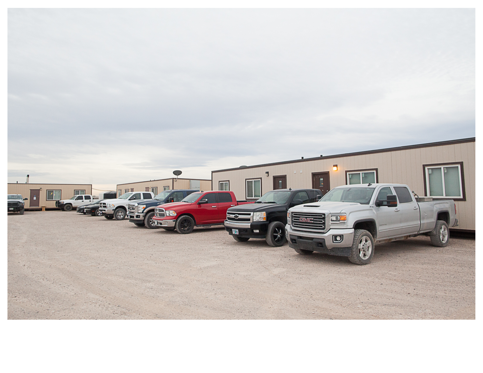 Pickup Trucks outside Oilfield Worker's Trailers, Pecos, TX
