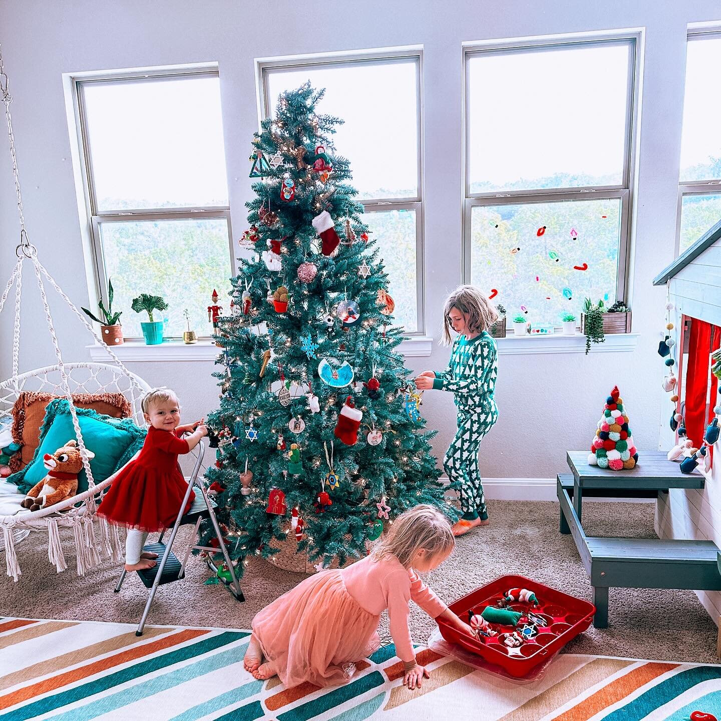 The kids put the final touches on their tree this weekend! ❤️ We are attempting to keep ornaments all over the tree, but skipped the breakables. So far Luna is really into removing ornaments but luckily also enjoys climbing the step stool and attempt