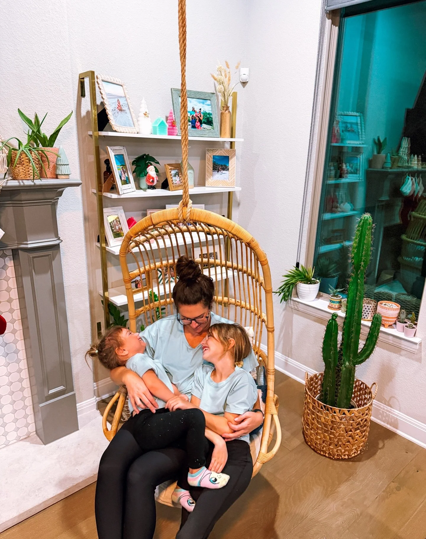 The Christmukkah countdown is on.  So is my urge to freeze these magical every day moments and rare Austin perfect weather. ☀️ Love the way Luna looks at her big sis. Three sleeps until Hanukkah. 🩵🩵🩵