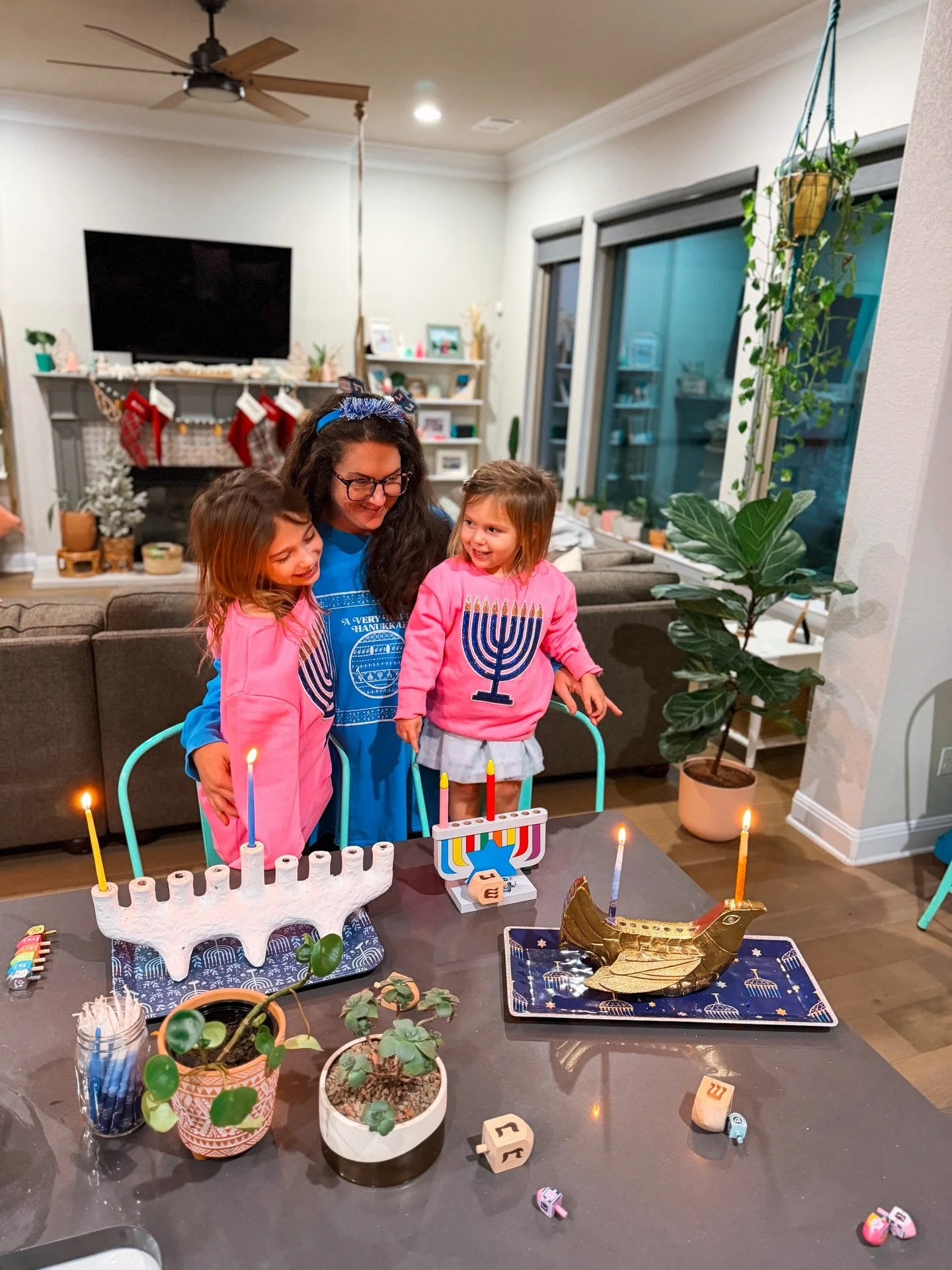 Lighting the first Hanukkah candles and hoping for a brighter tomorrow. 🕎 Sending love and light to those who need it today and always. 🩵 Happy Hanukkah. 

Swipe to see Trig celebrating his very first Hanukkah. He was very excited and tried to eat 