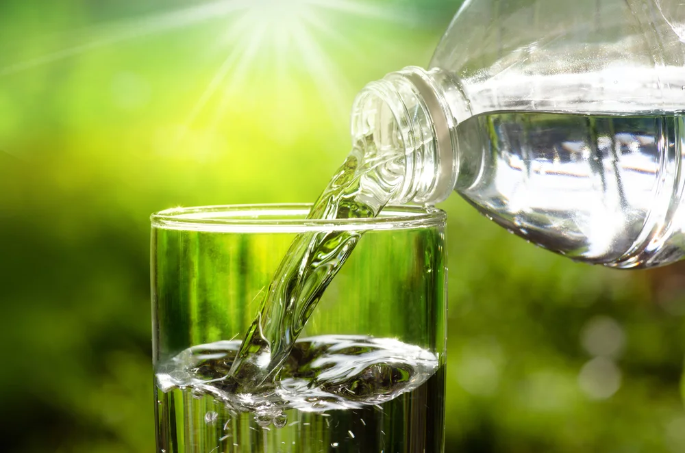 water bottle pouring in glass.jpg