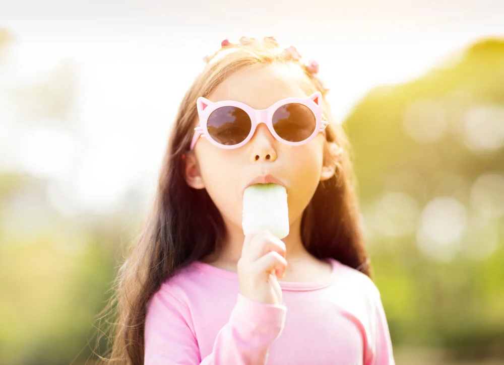 girl eating popsicle.jpg