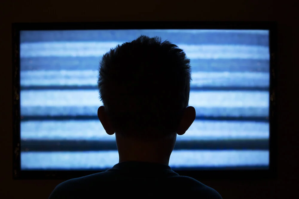 boy watching tv.jpg