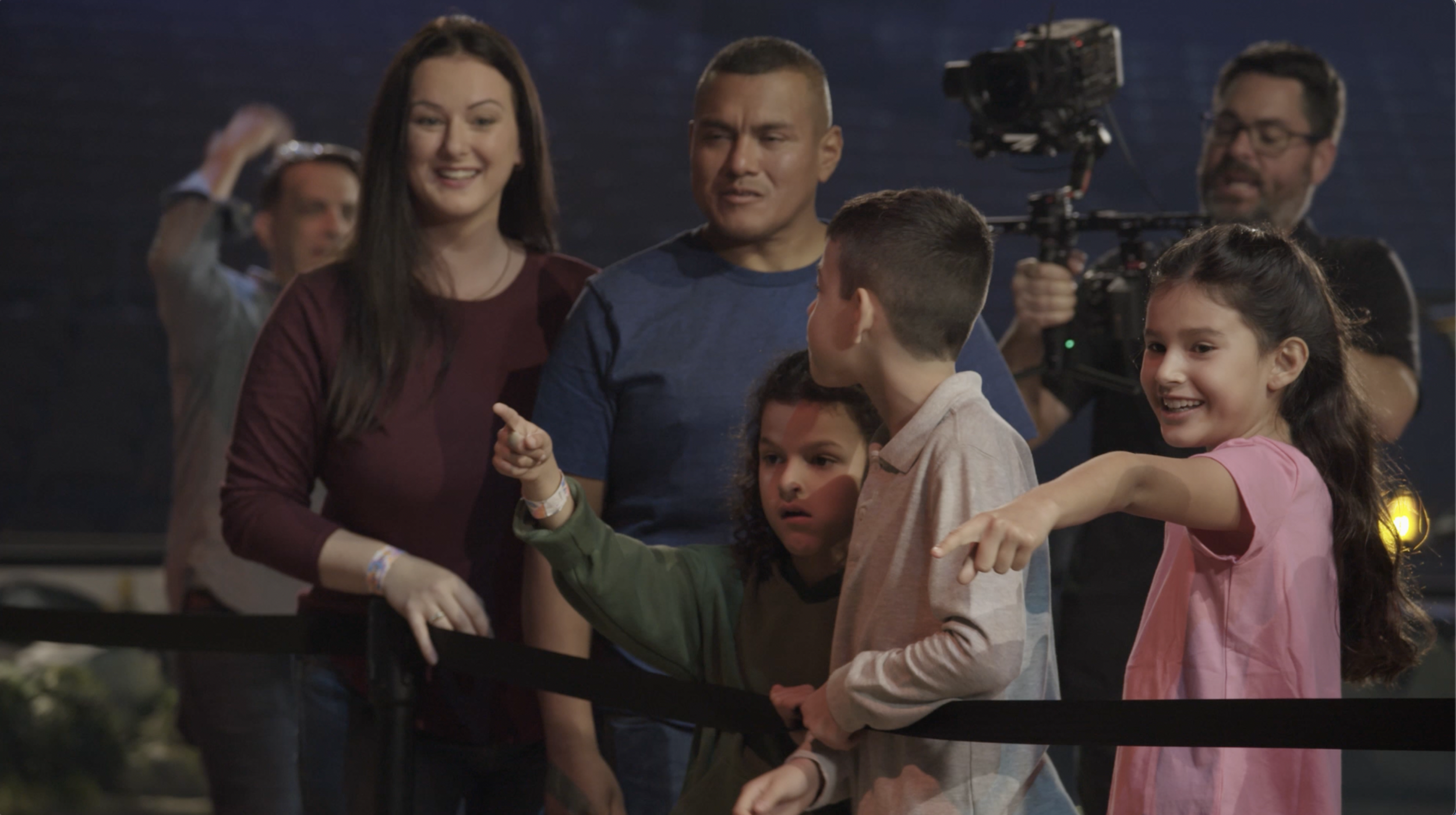 A Chicago BTS camera crew records behind-the-scenes footage for a TV show, Jurassic World Live Tour. In addition to gathering footage from television sets, the Chicago videographers have recorded television interviews for Fox and Amazon Prime Video.