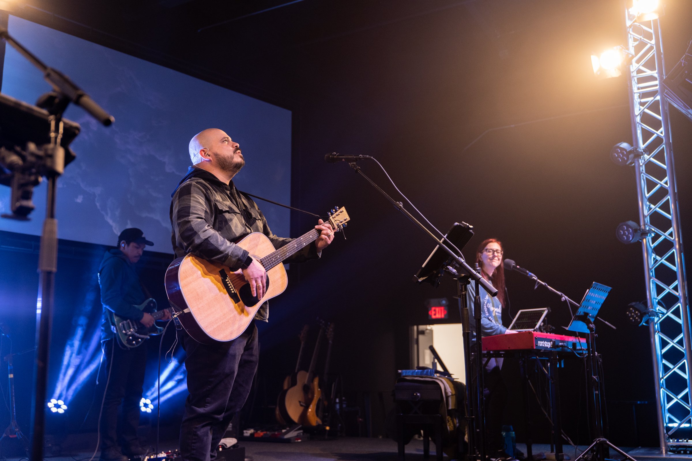  Pastor Travis Whitney leading worship during one of our monthly worship nights at our new building.  