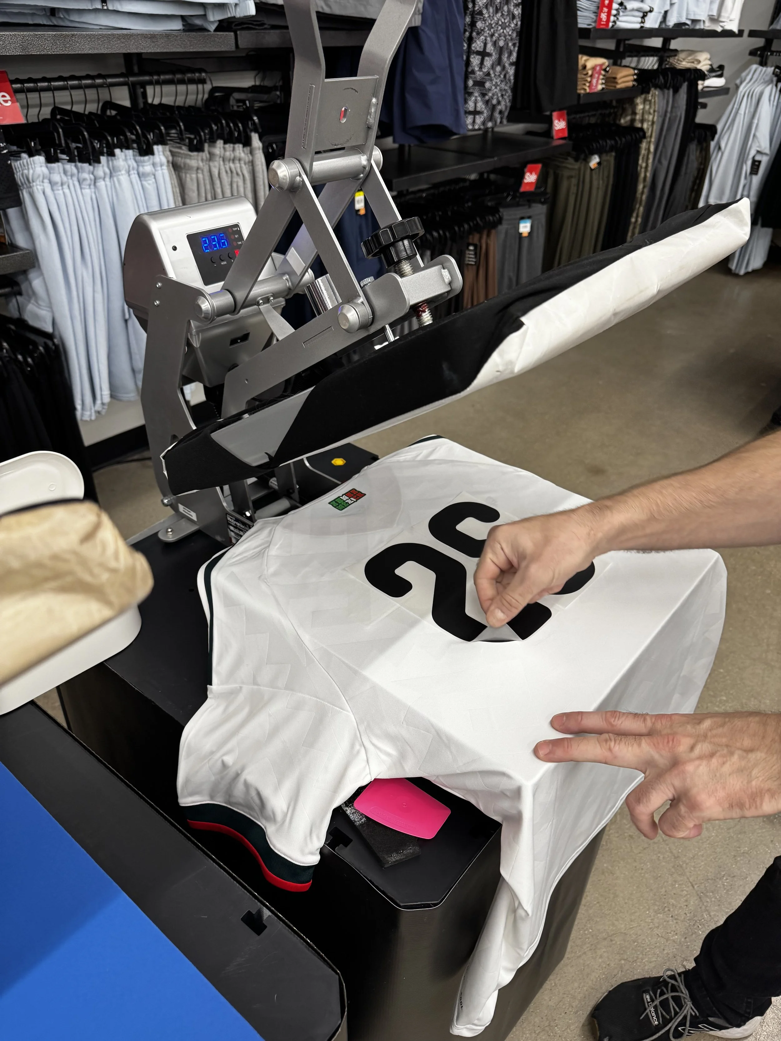 after being pressed onto the jersey the decal backing needs to be peeled off while item is still warm