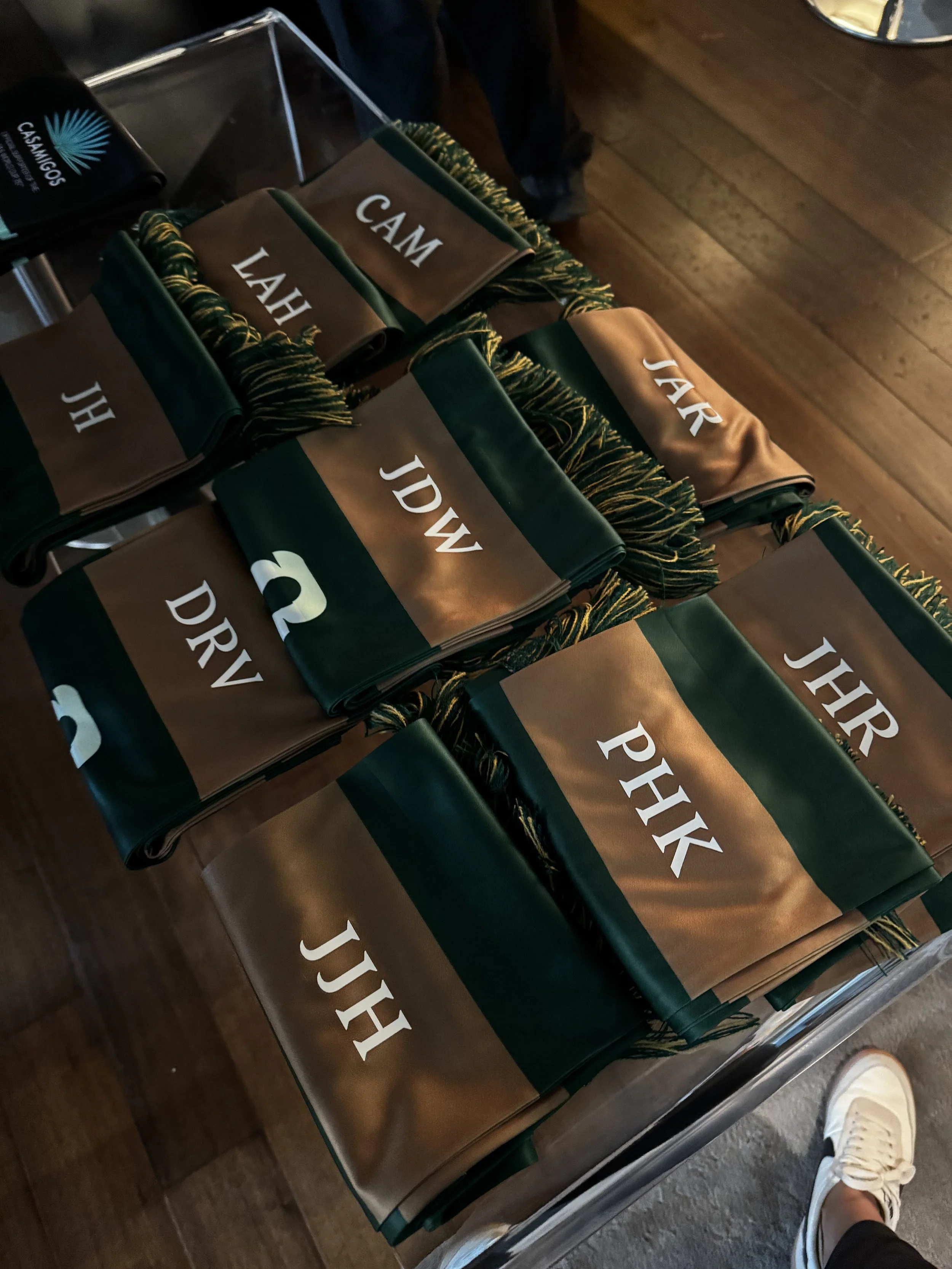 All the monogrammed scarves lined up and ready for guest pick up
