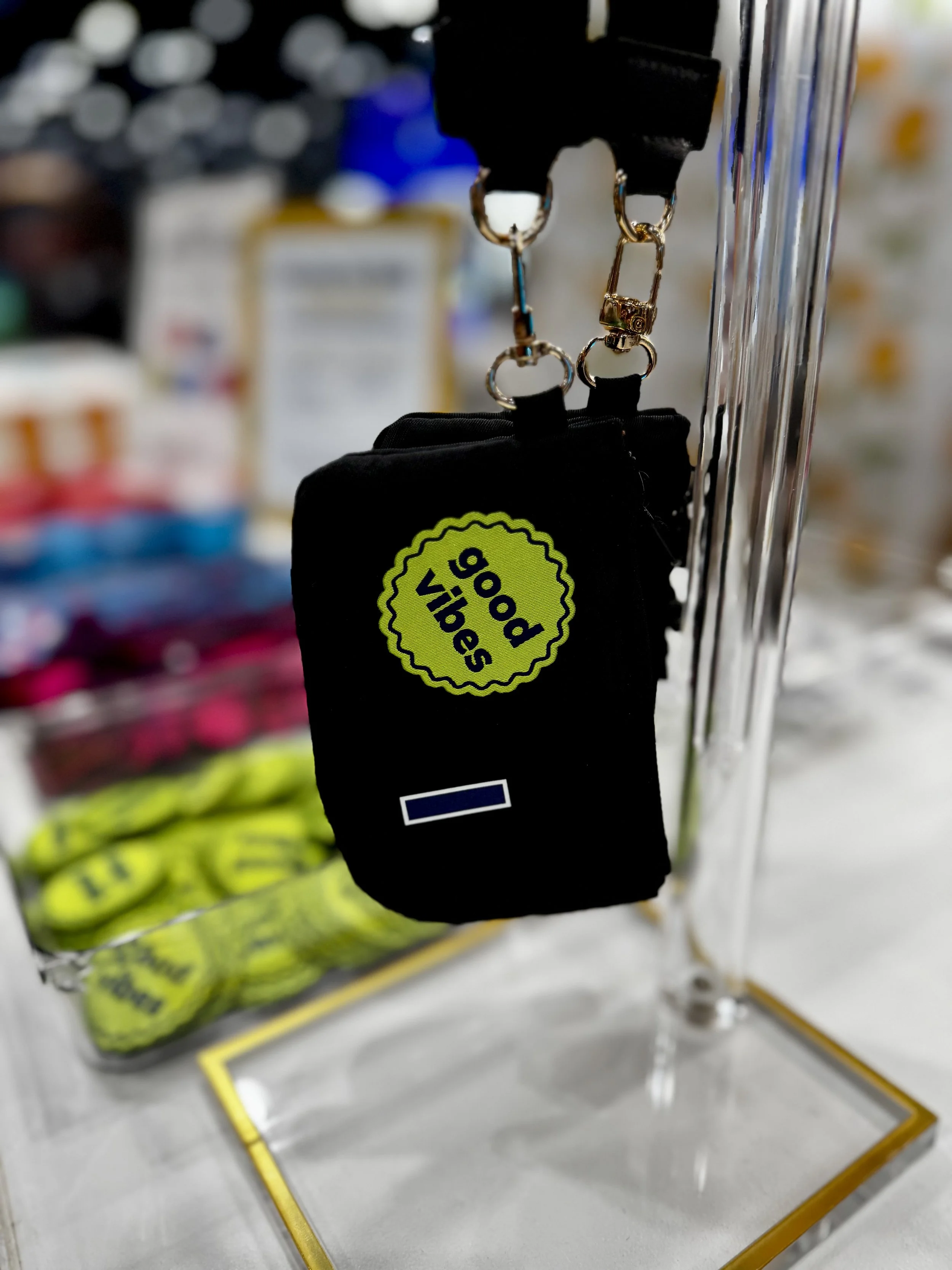 Smaller wristlet / coin purse offering to be monogrammed or have woven patches applied to it live on site