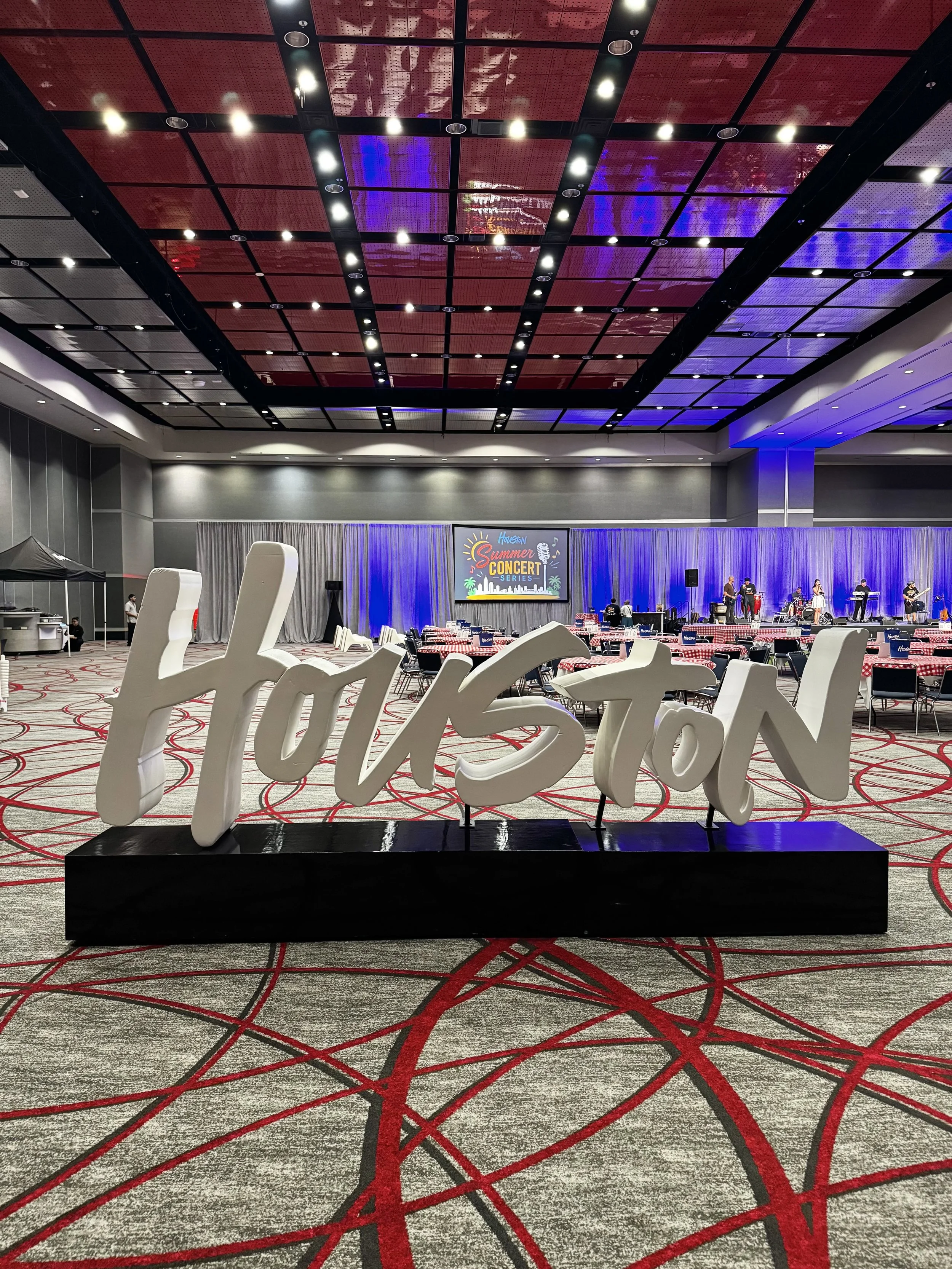 Classic Houston First logo signage on display