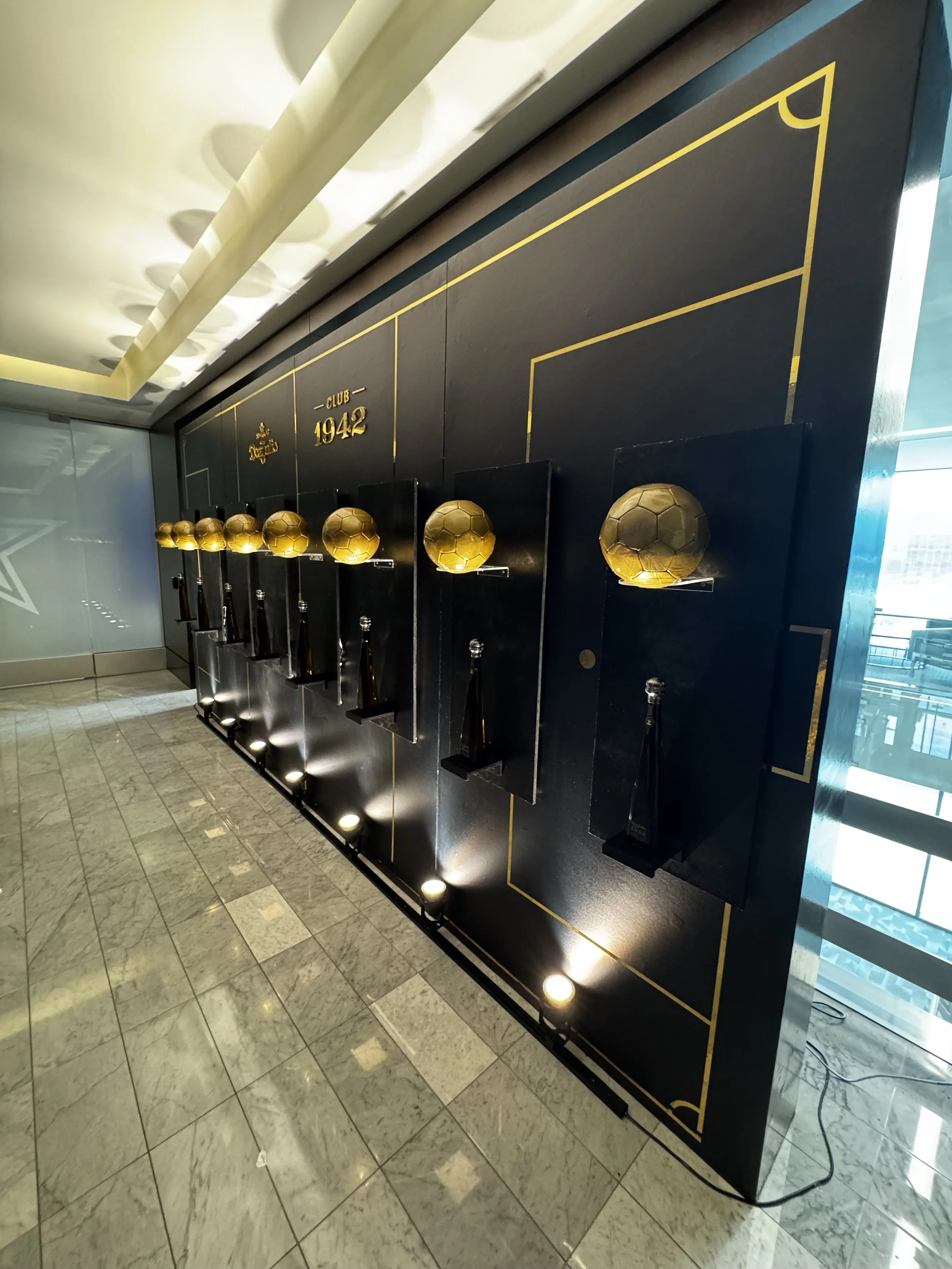 Golden futbols decorate the Cowboy's clubhouse