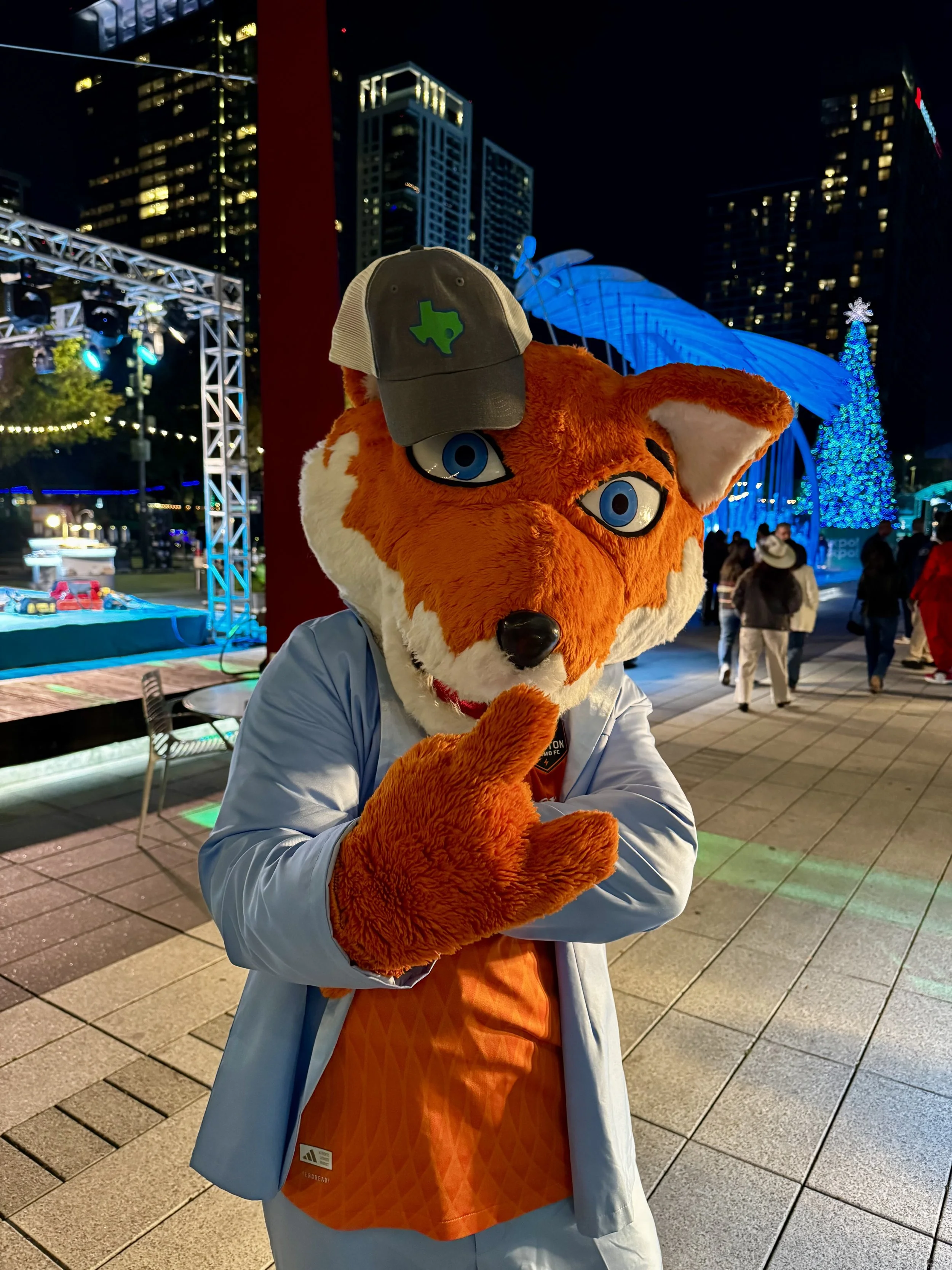 Houston Dynamo mascot diesel models a freshly pressed trucker hat
