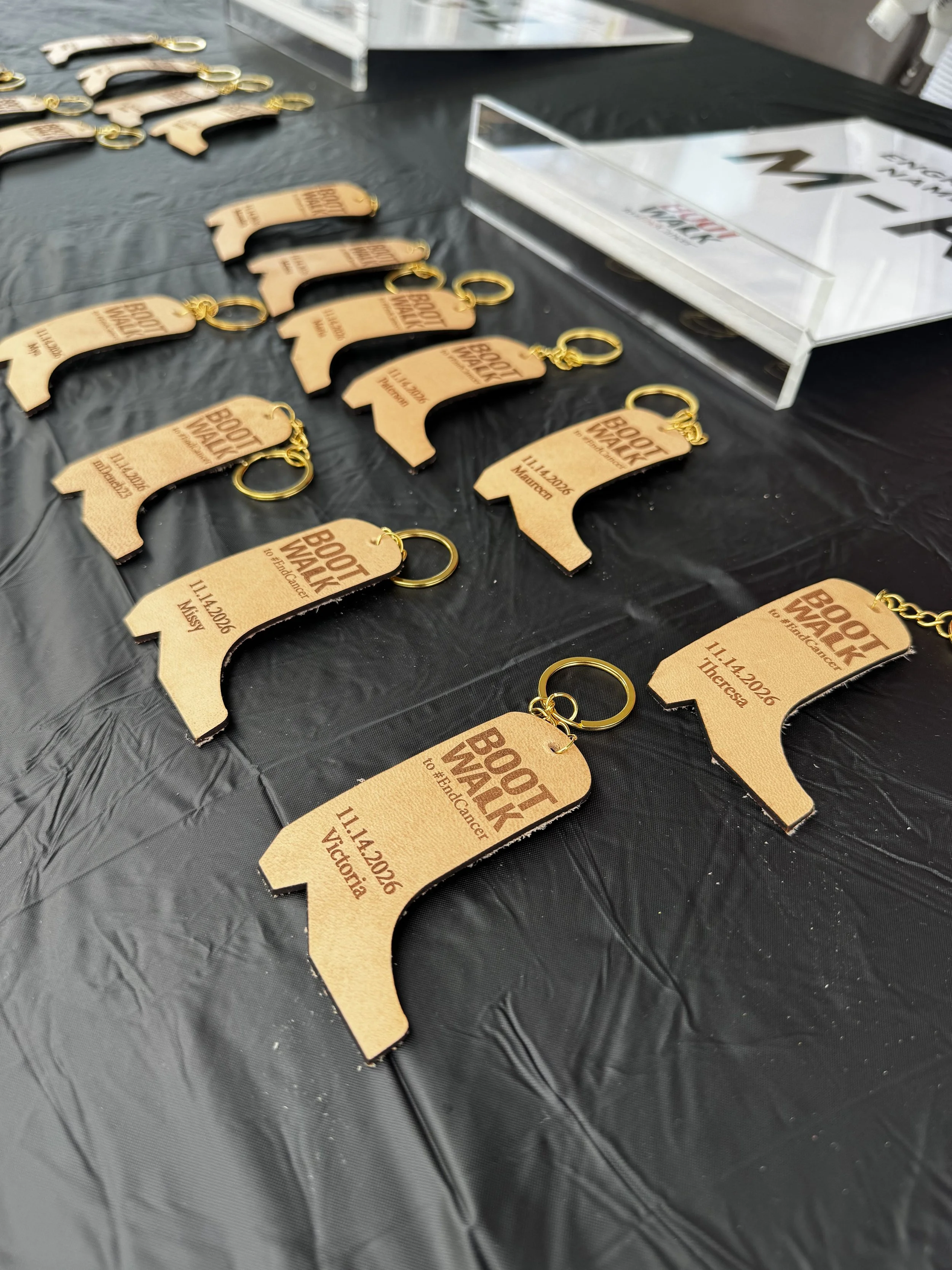 Pick up area for guests to retrieve their live laser engraved leather keychain for this years boot walk kick off