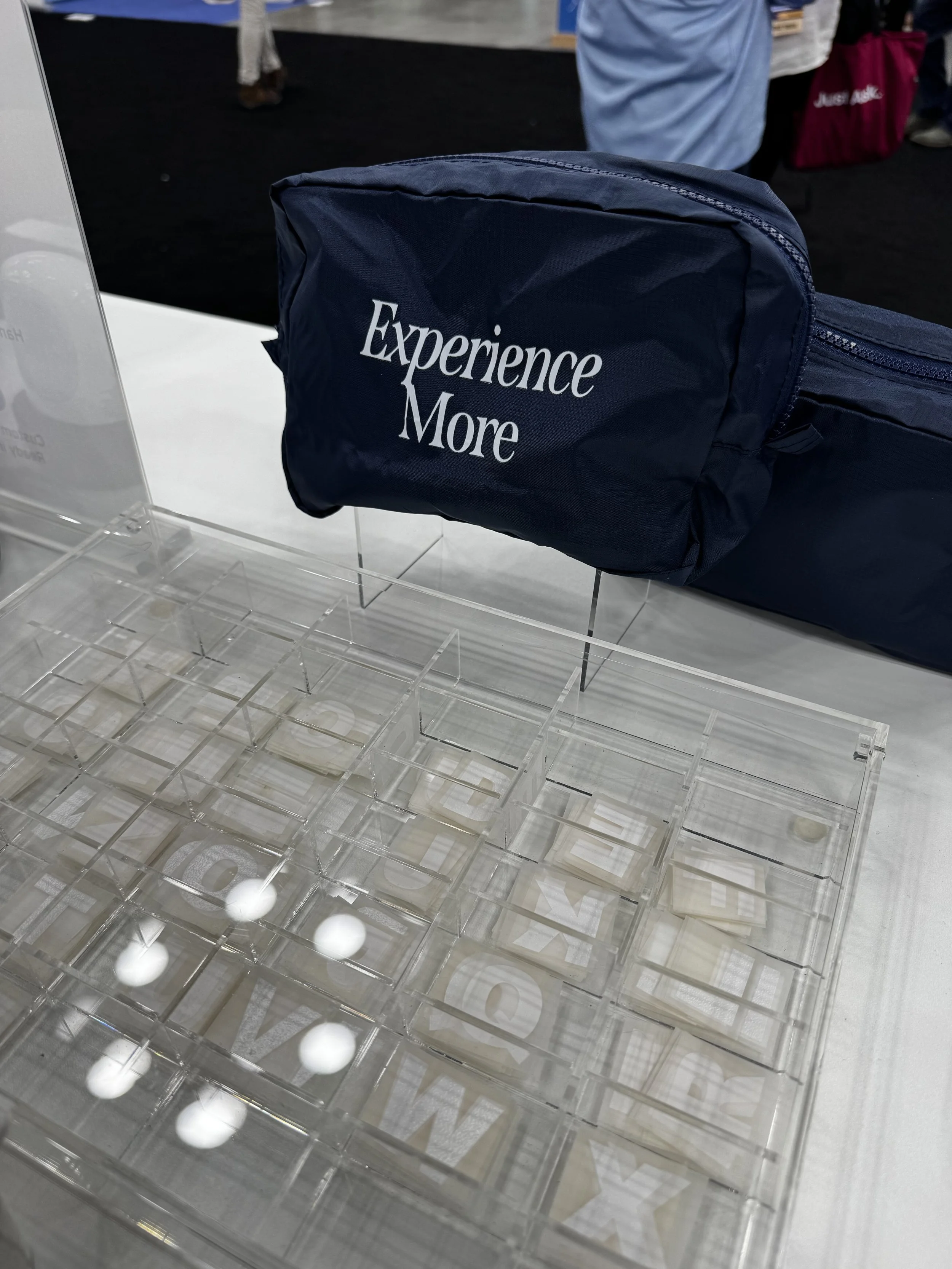 tray holding the letters to be applied with heat and pressure by adpat staff live on site at asae conference in indianapolis