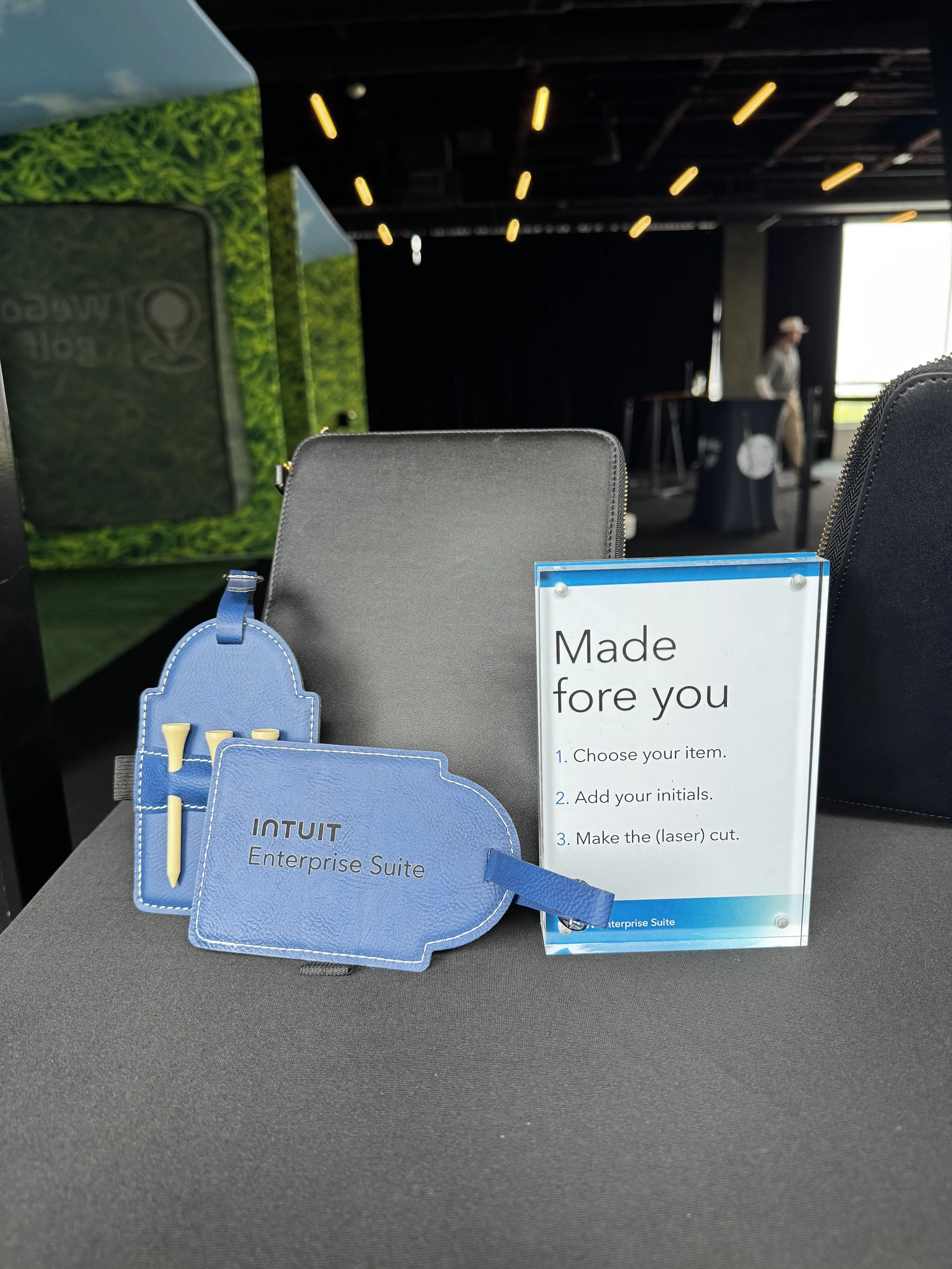 Items available to be live laser engraved at Intuit Client event and sign outlining steps to the process