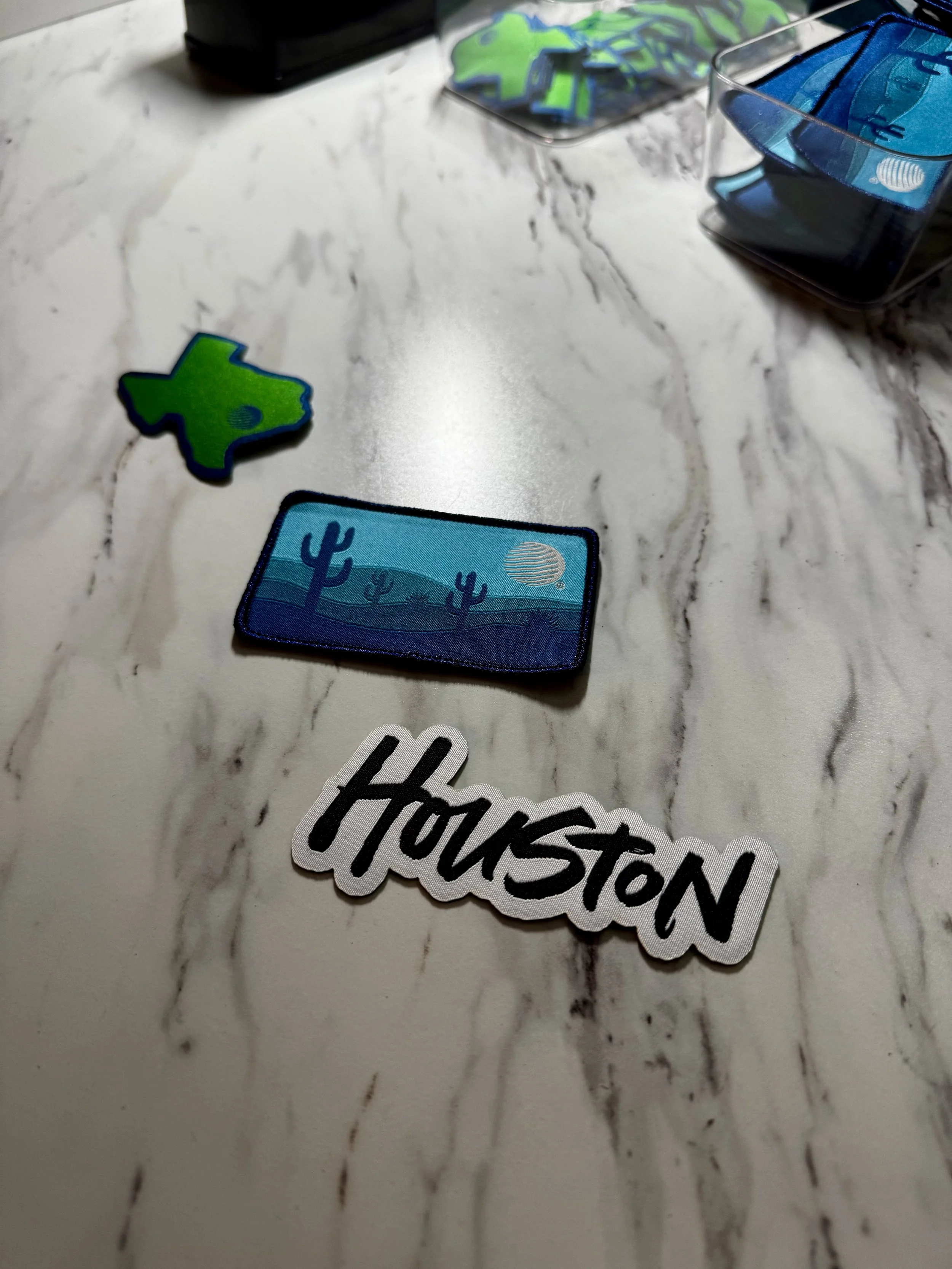 close up of woven patches designed exclusively for the 2025 expo expo event launch party