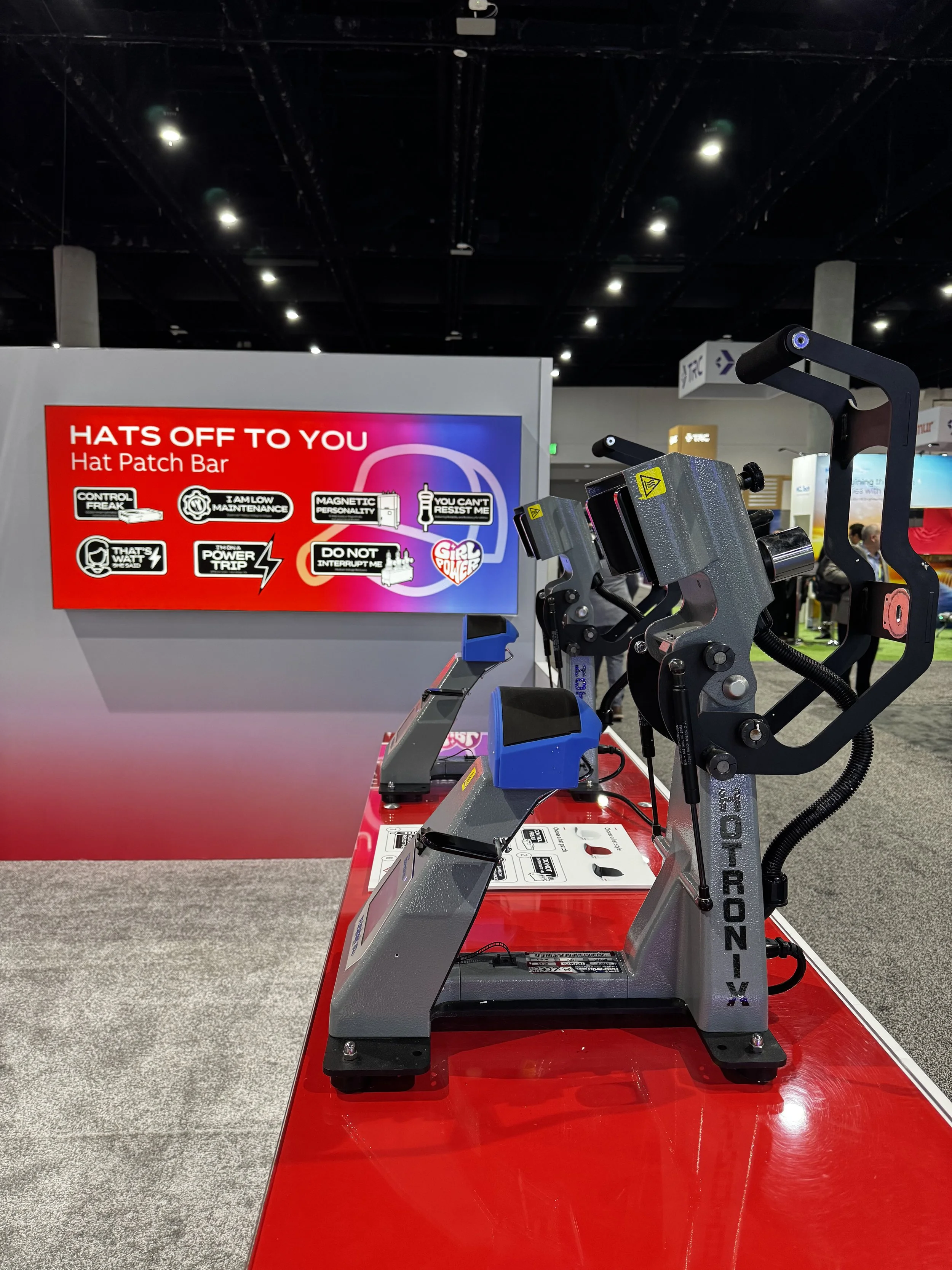 Table set up with our hat heat presses ready to go