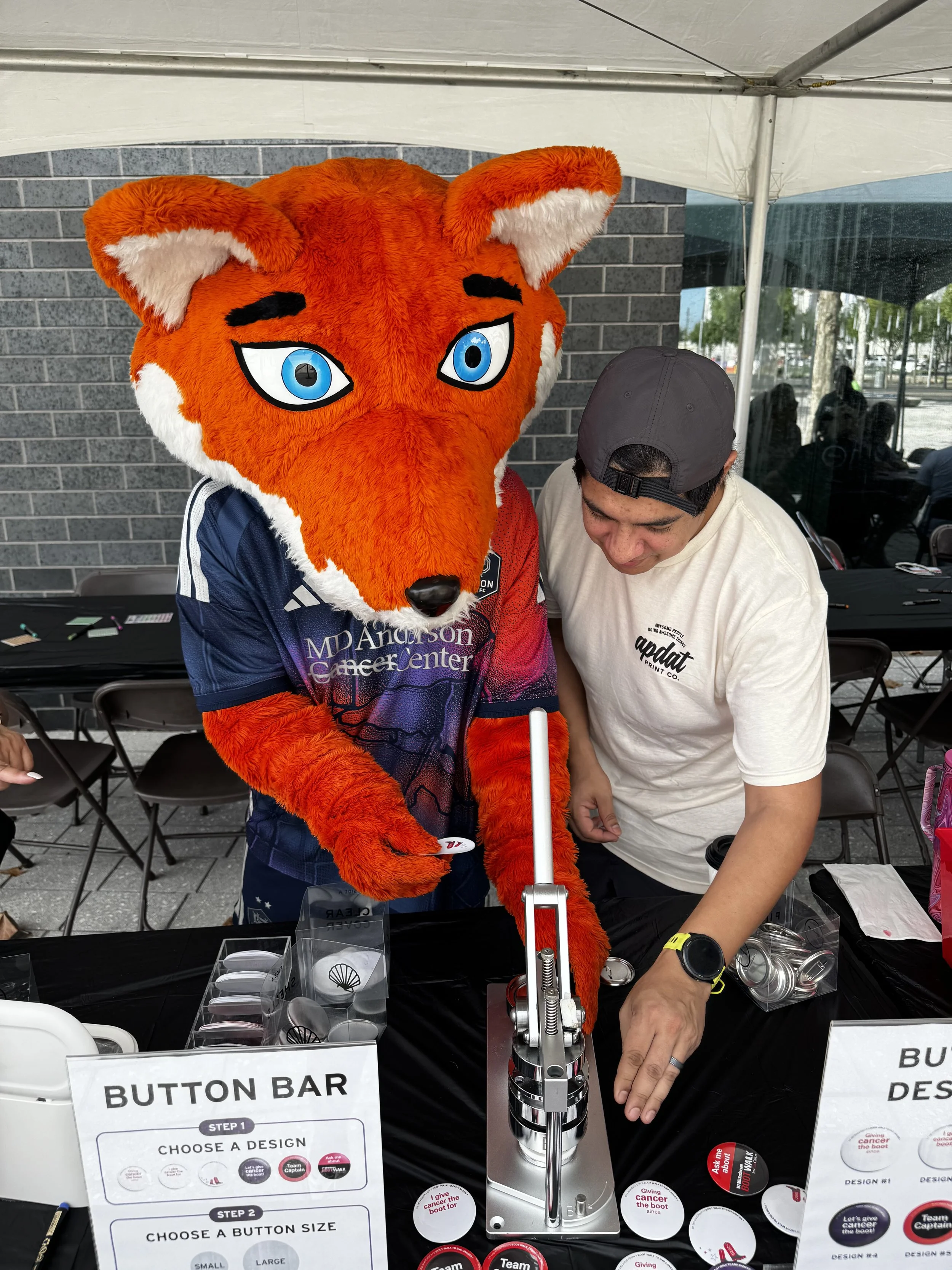 Dynamo's mascot visited the boot walk event and helped us press buttons live on site