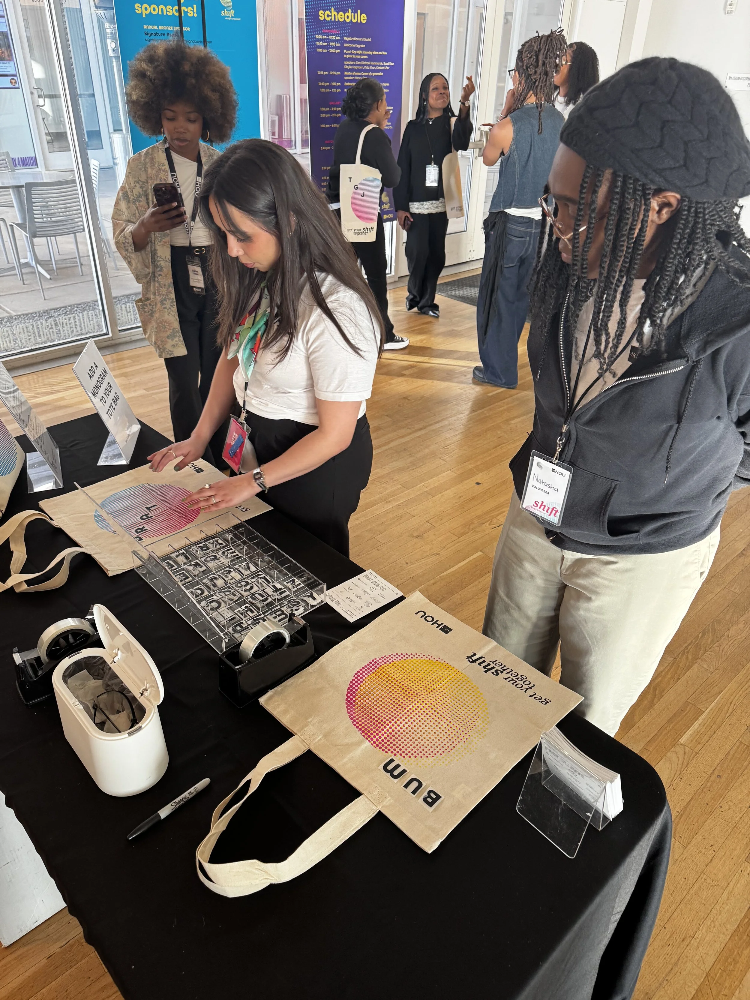 Station where attendees could add a monogram to their freshly screen printed tote bag
