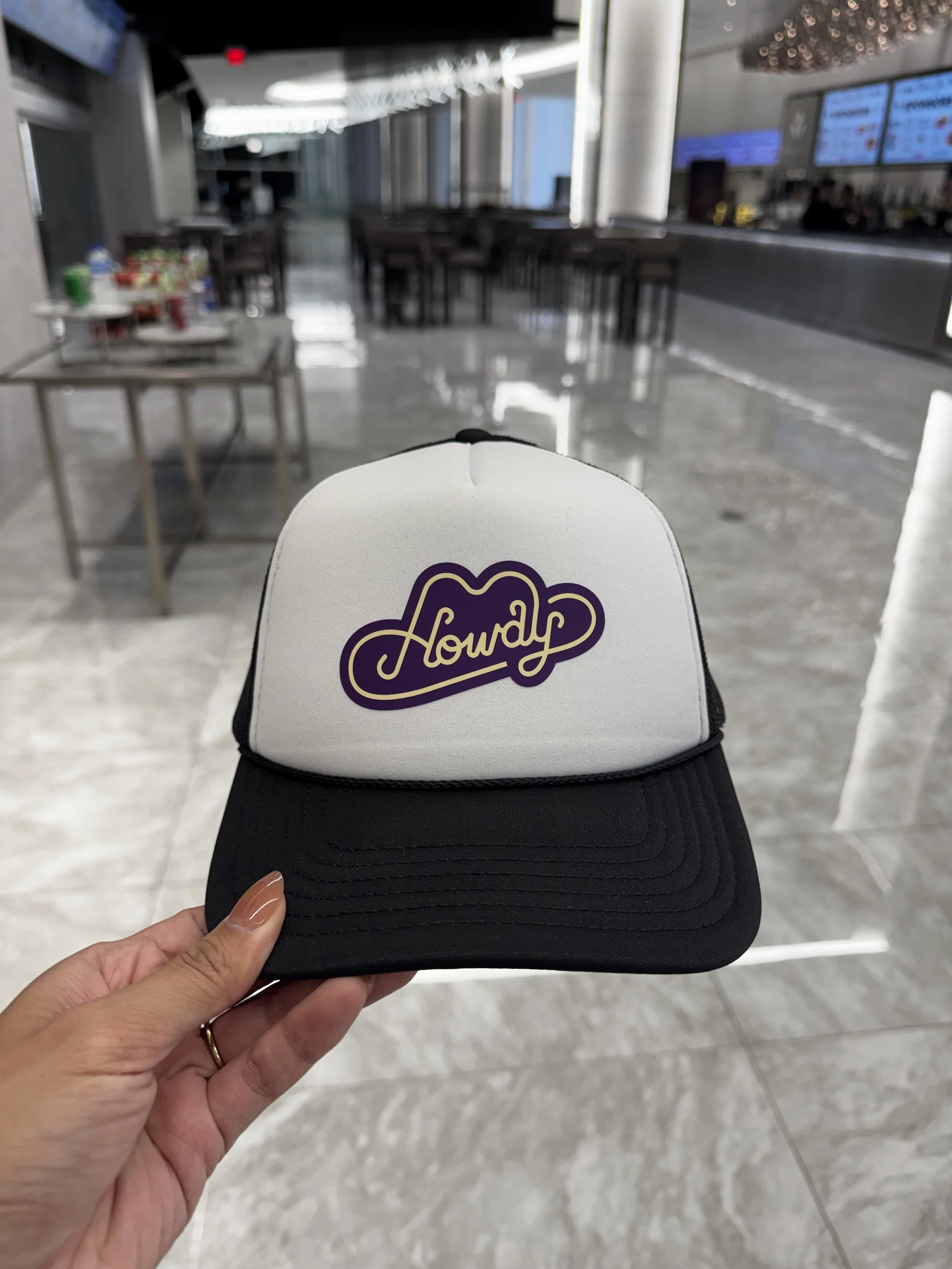 Cowboy hat decal in Crown Royal colors presssed live on site during event at Cowboys stadium
