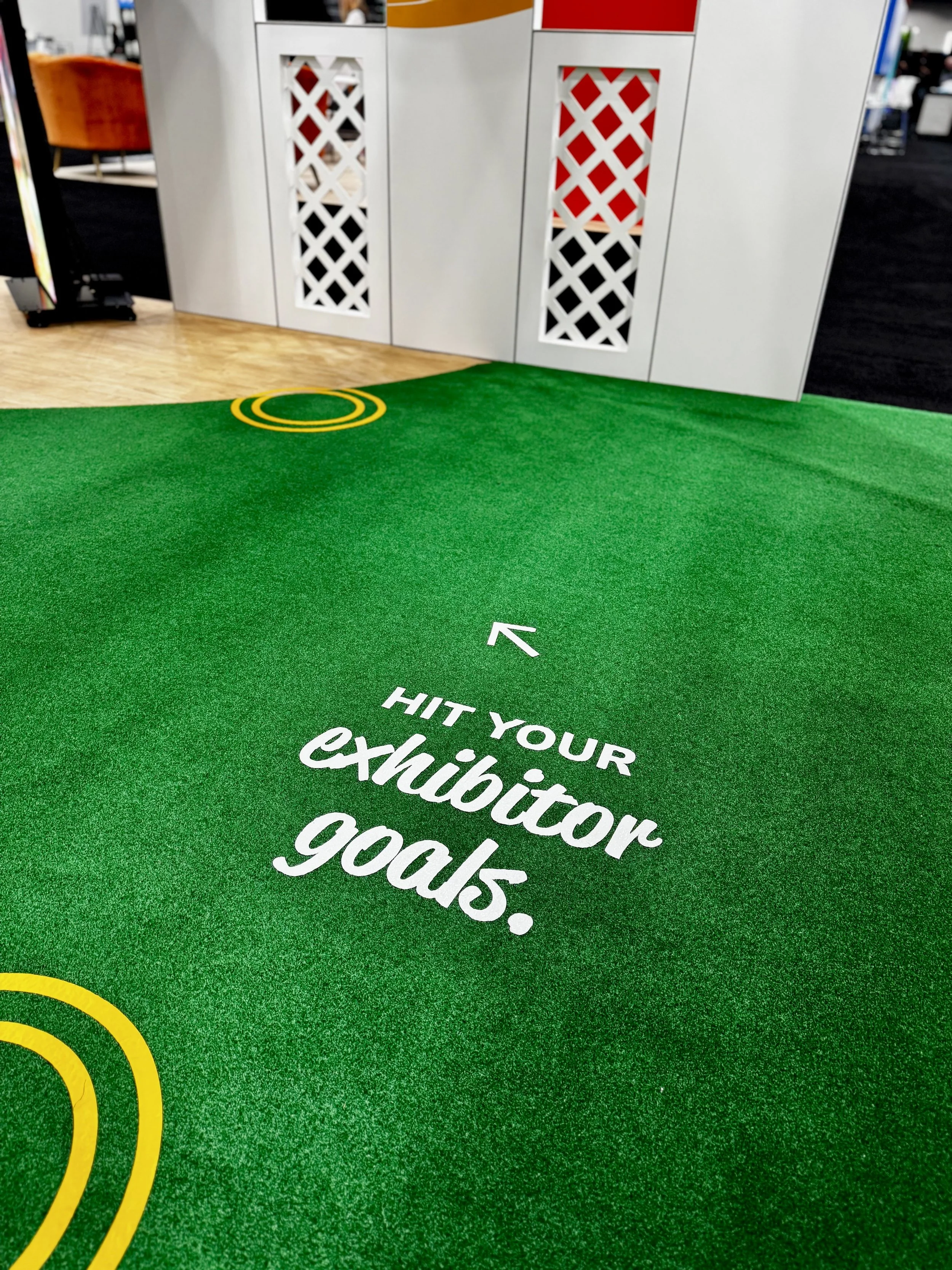 Detail of flooring inside of freeman's summery outdoor themed booth