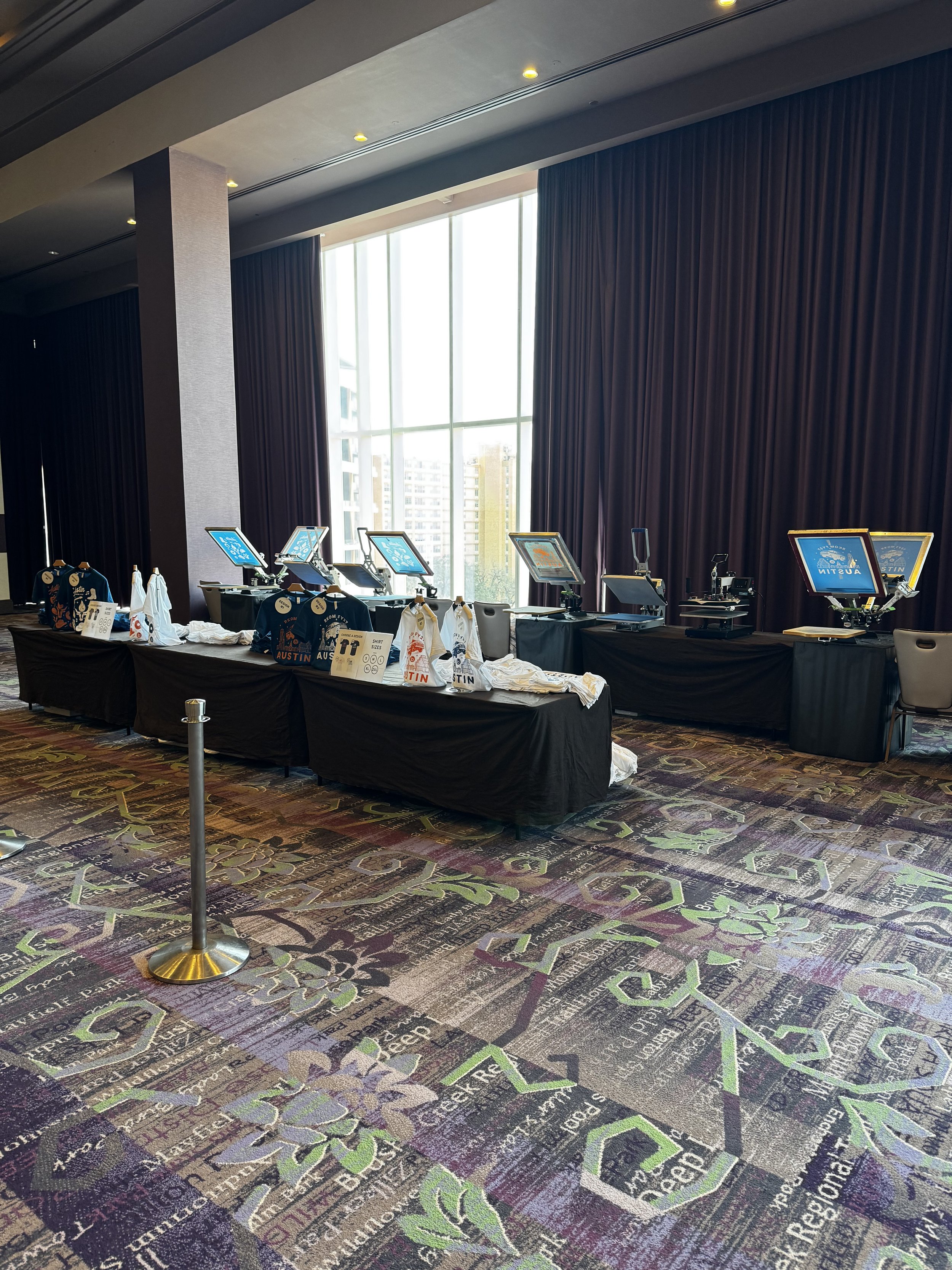 Extensive set up for high output event required 4 printing presses as well as 4 dryers to be operating at once