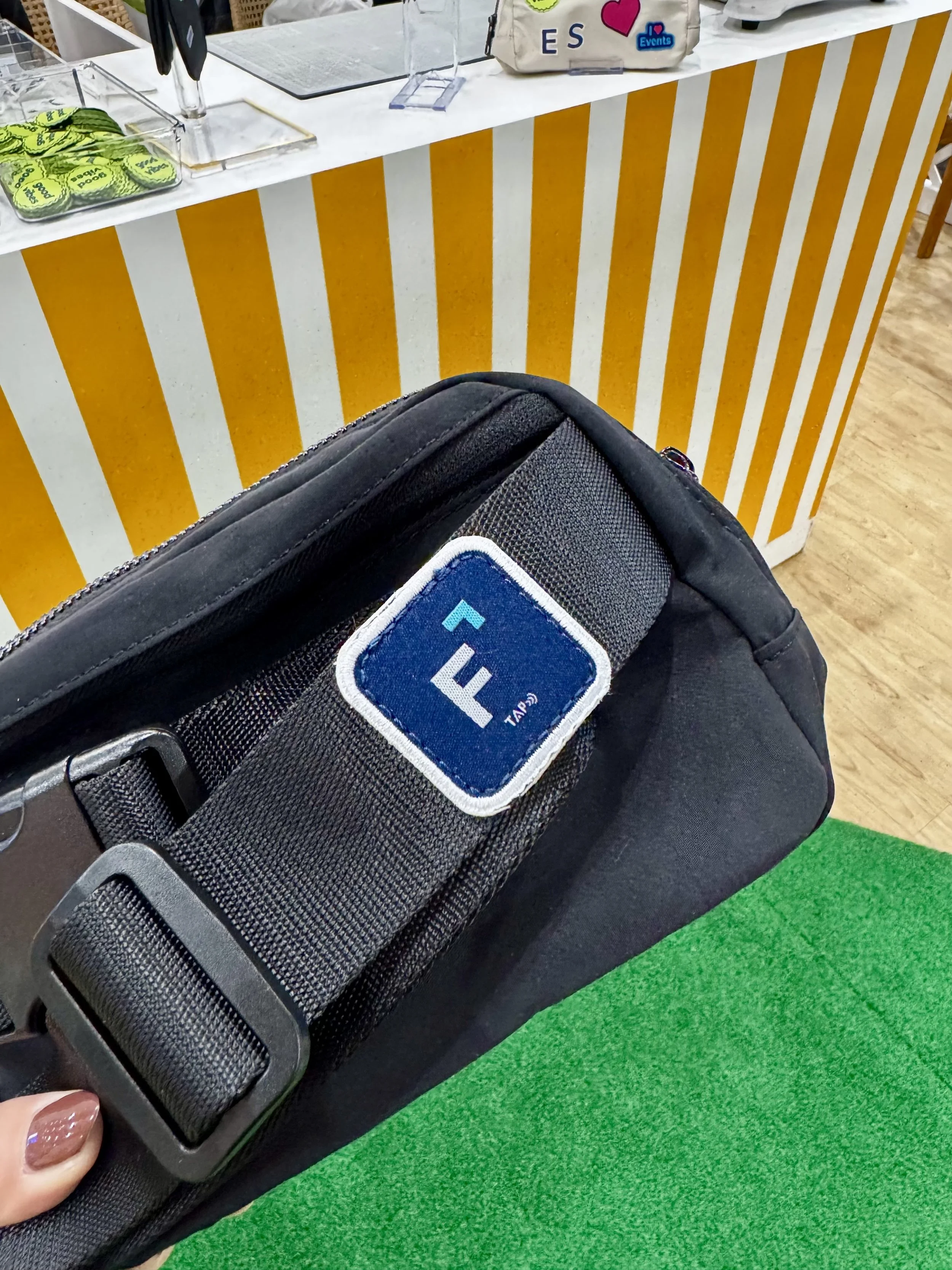 NFC tags pre embroidered onto belt bags that can be tapped and will open up a website on your phone to share info, a service we can provide