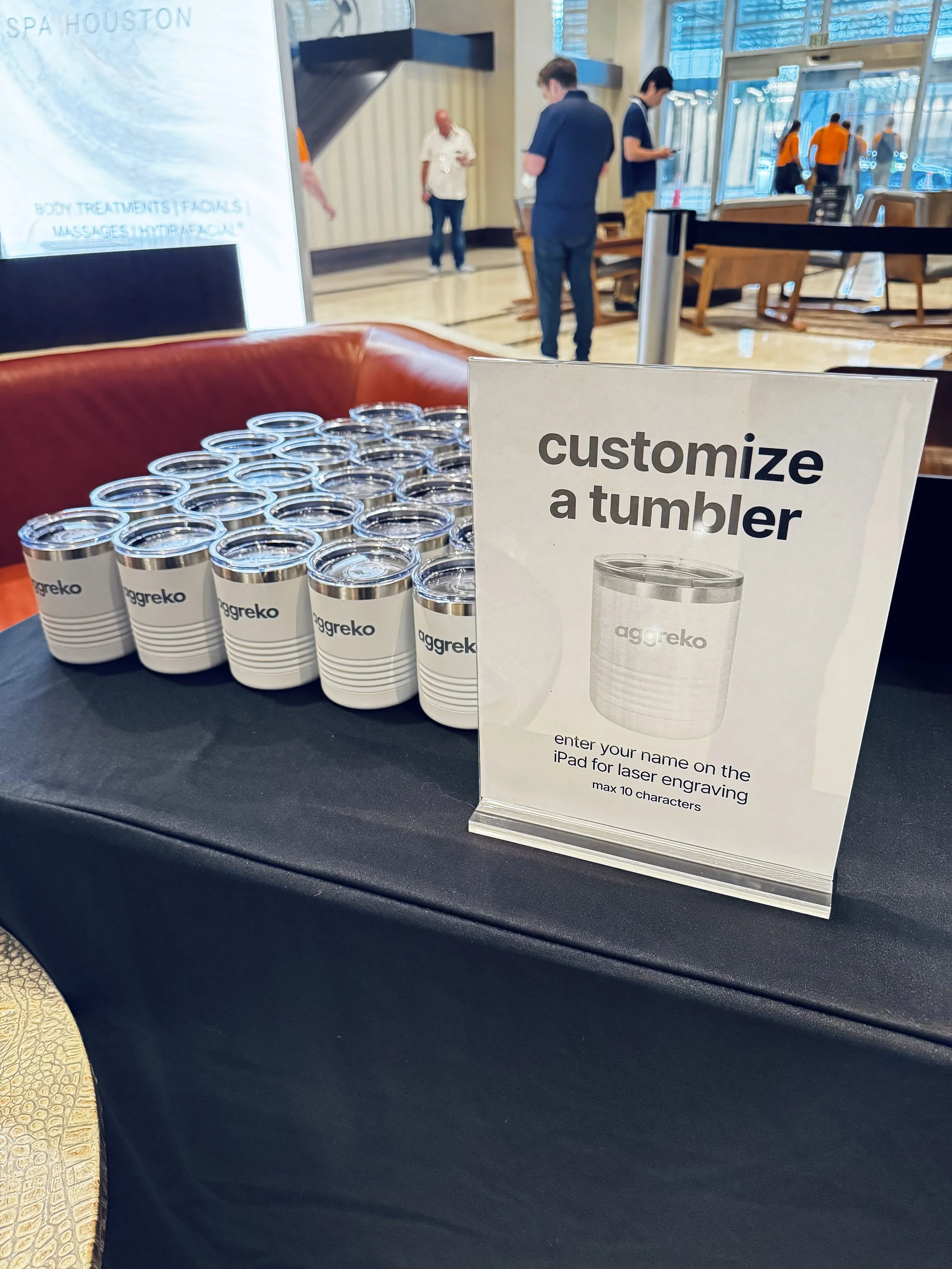 Signage explaining the process to get a customized tumbler