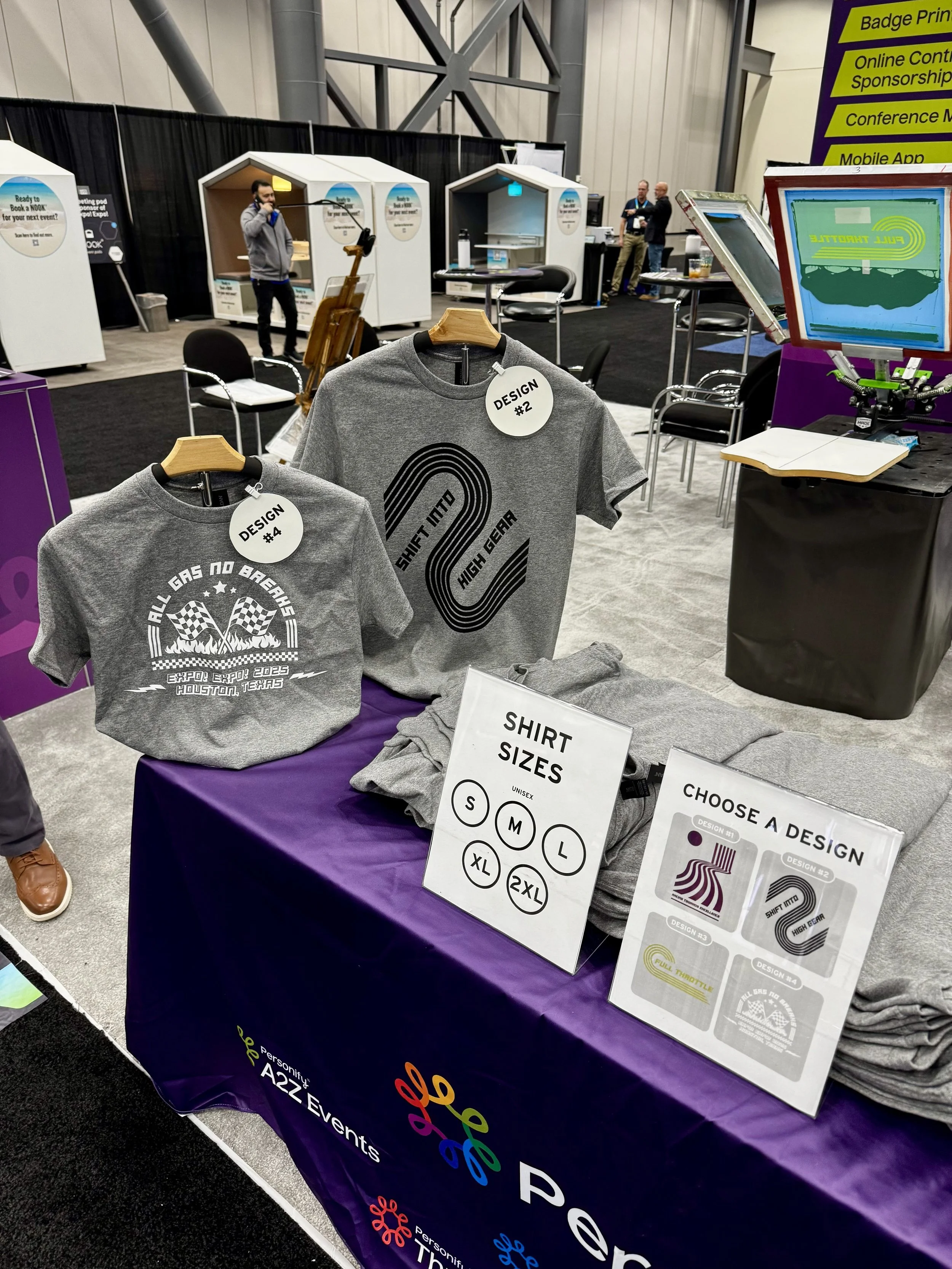 Live screen printing shirts booth display