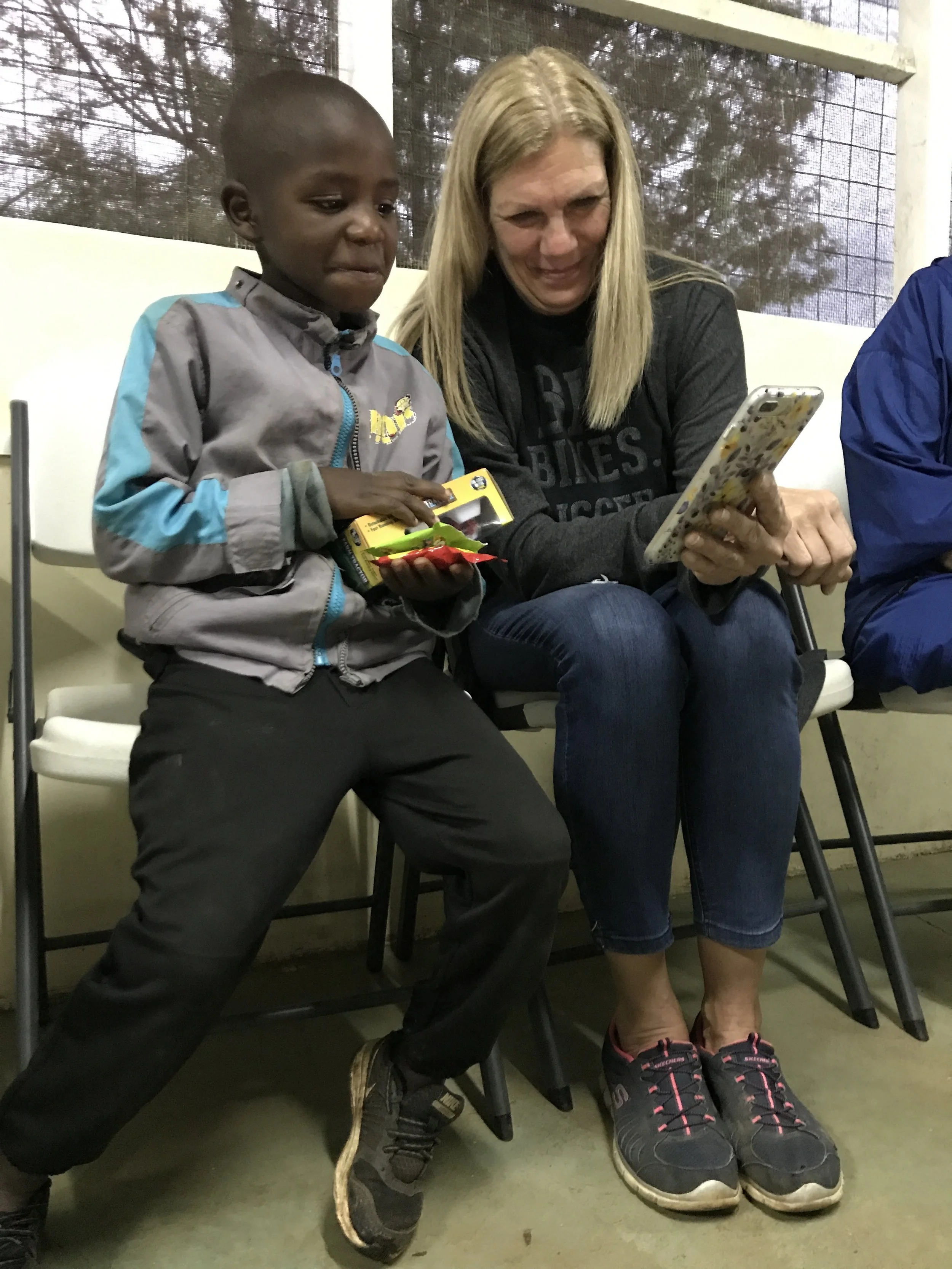 A volunteer spending special time with one of our students.