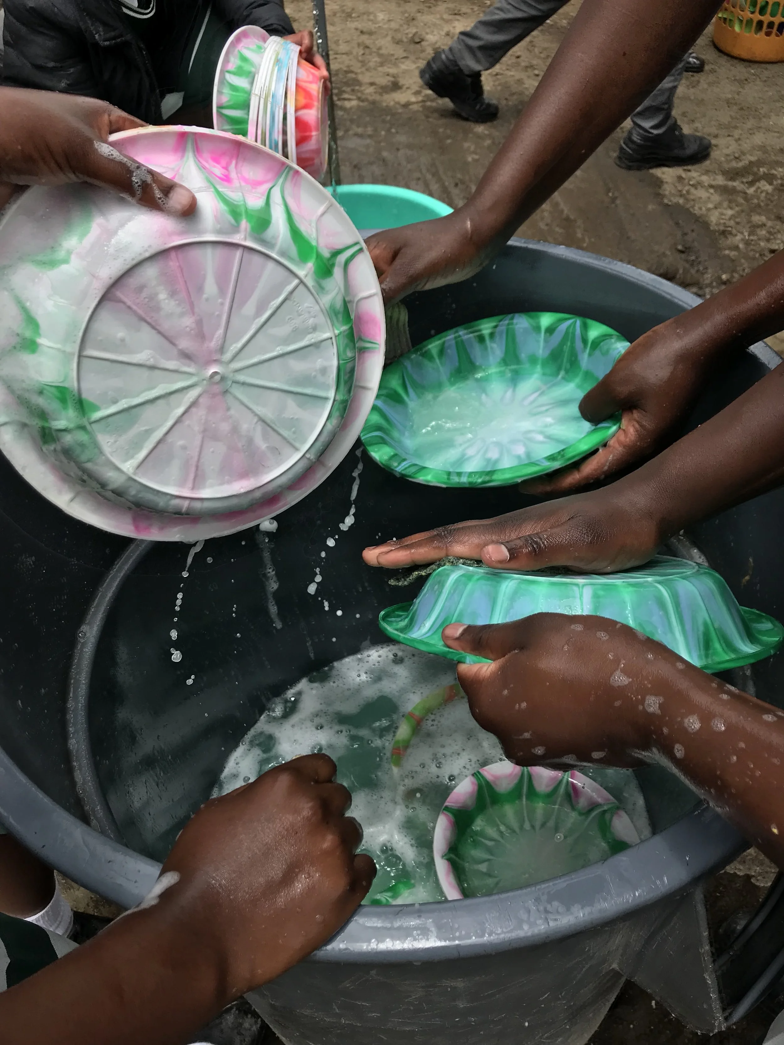 A beautiful picture of how every student helps with mealtime cleanup.