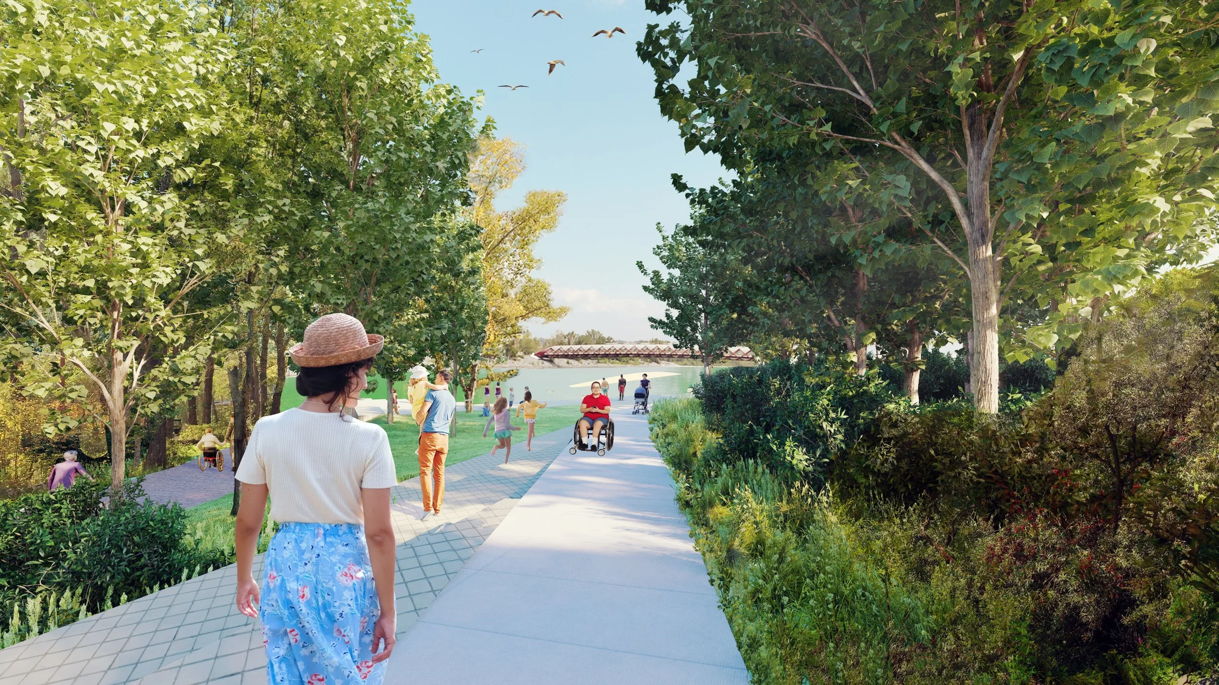 People walking and enjoying a scenic park pathway with trees and greenery.