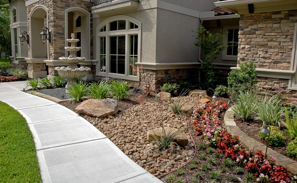 A low maintenance xeriscape for a grand house and property.