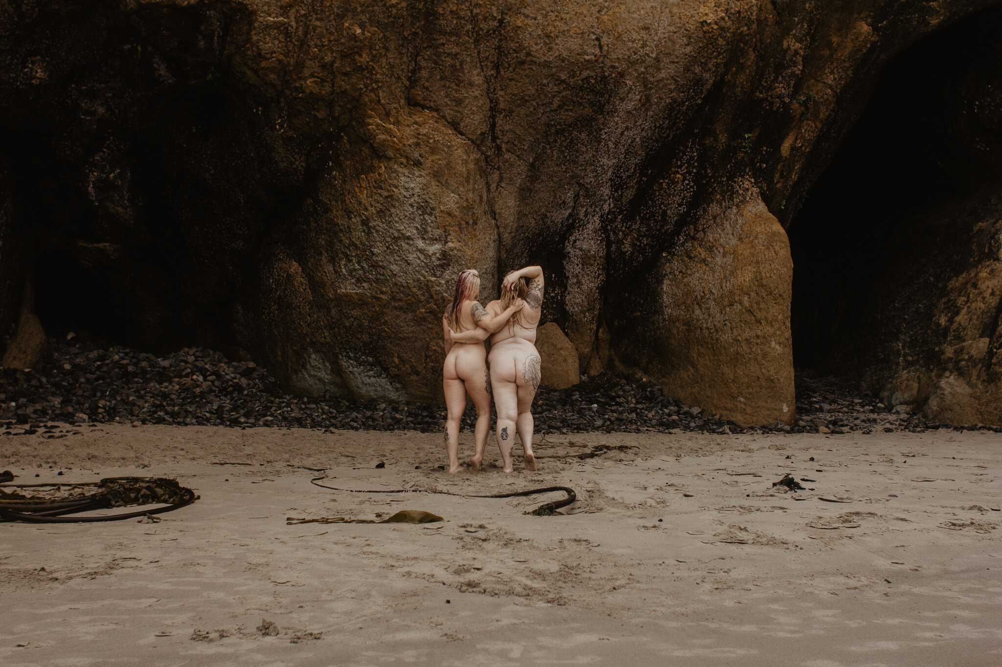 Naked lbgtq couple at beach