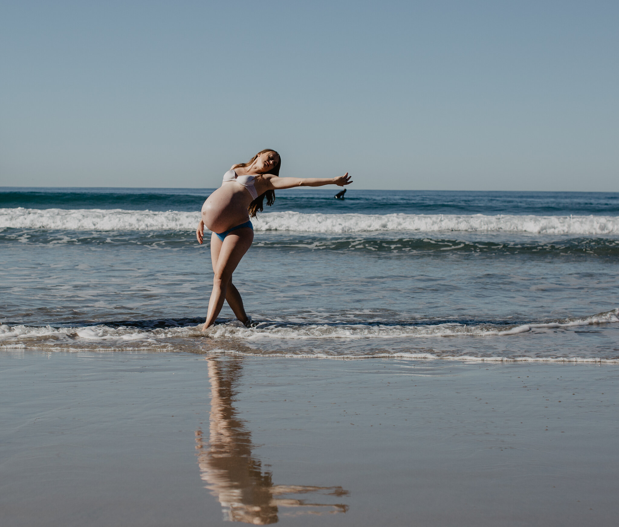 Prego woman dancing on beach