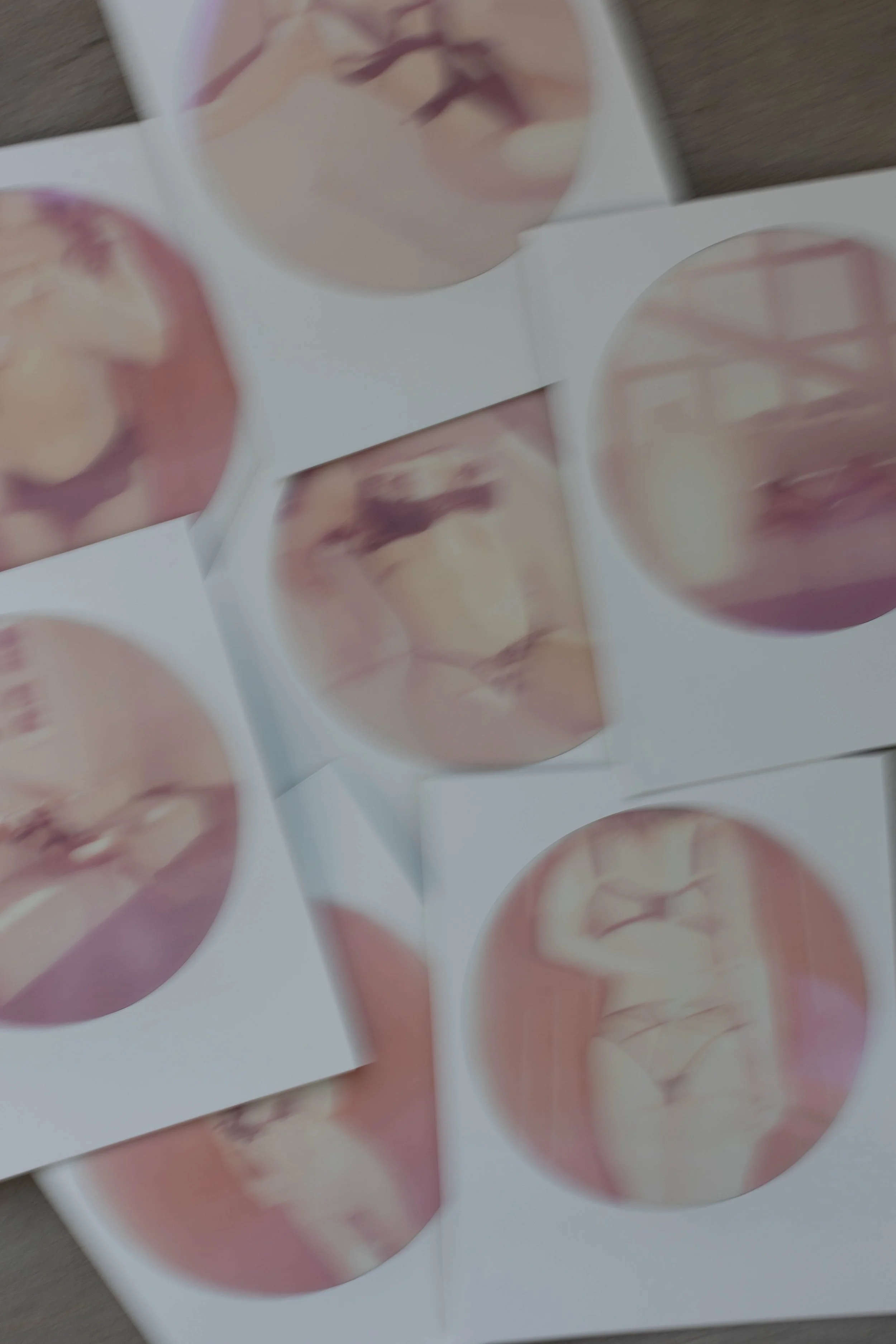 A spread of boudoir polaroids with some motion blur