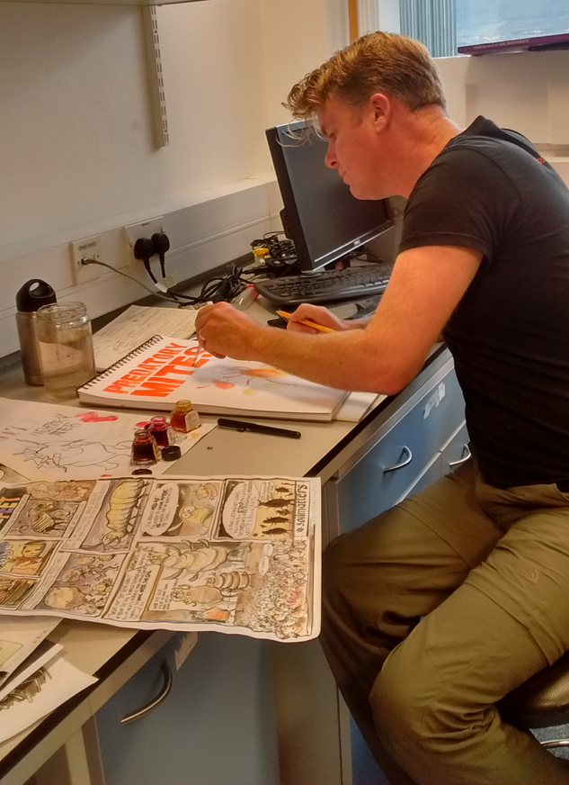Artist Ed Reynolds at work. Photo credit: T. Caruso