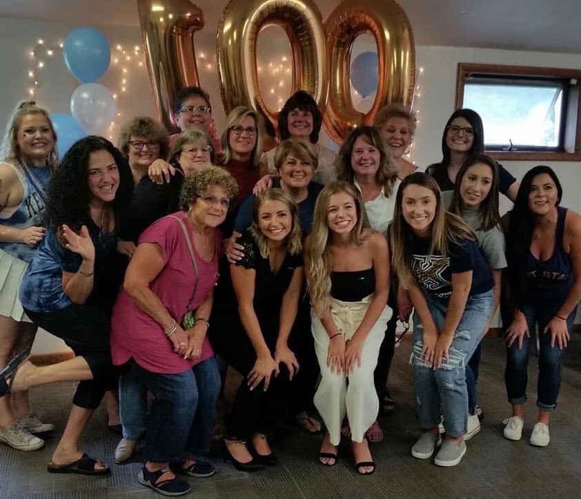 Sisters of the Beta Tau Chapter of Alpha Xi Delta celebrating 100 years of Homecoming