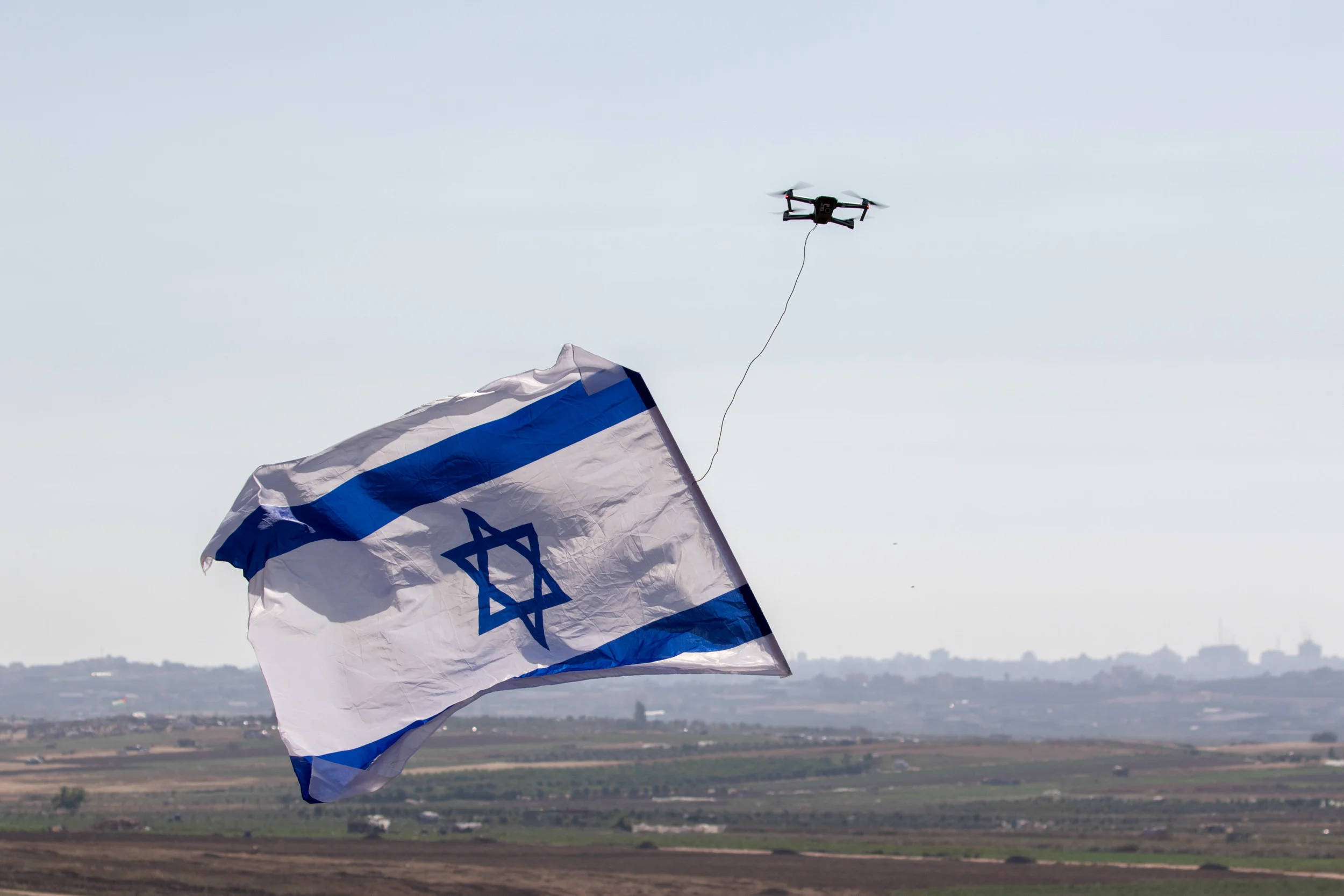 Northern Gaza Border, June 2018 - Small drone carries the israeli flag, sent by Israelis leaving near the gaza border