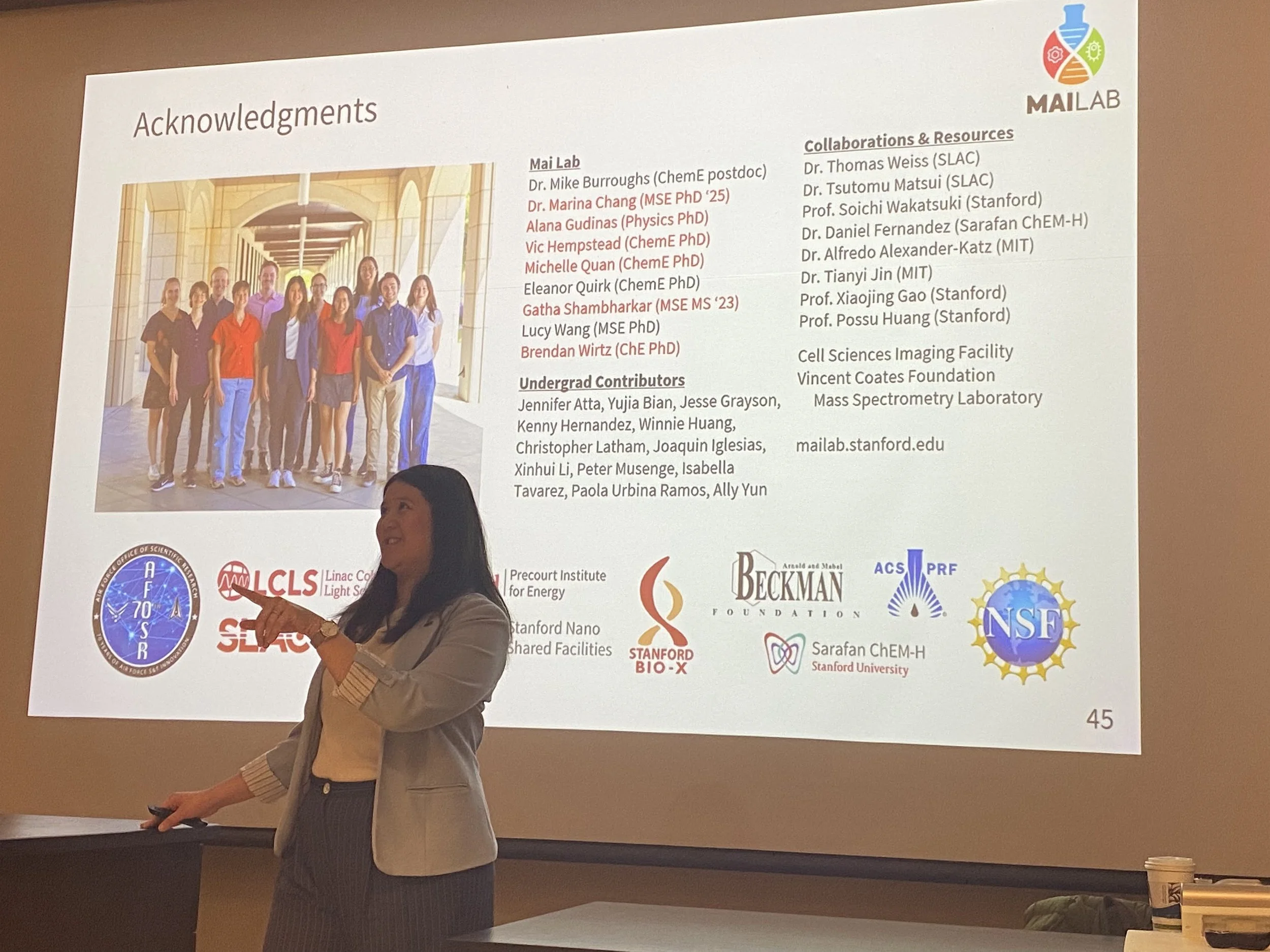 Danielle stands in front of an acknowledgments slide