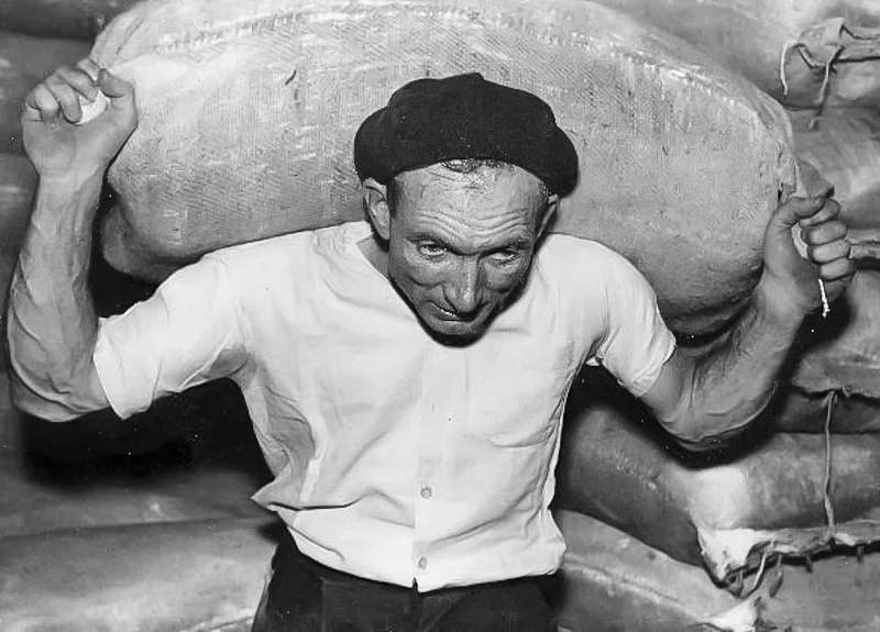 Humping bagged flour for the ship’s hold