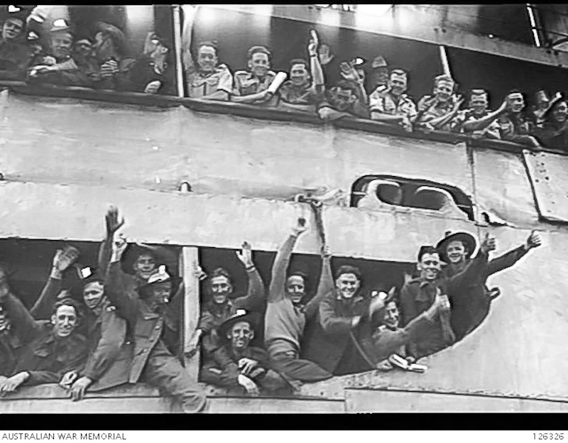 Soldiers and Airmen from BCOF (British Occupation forces) aboard troopship Duntroon departing Pyrmont wharf for Kure Japan. March 1946