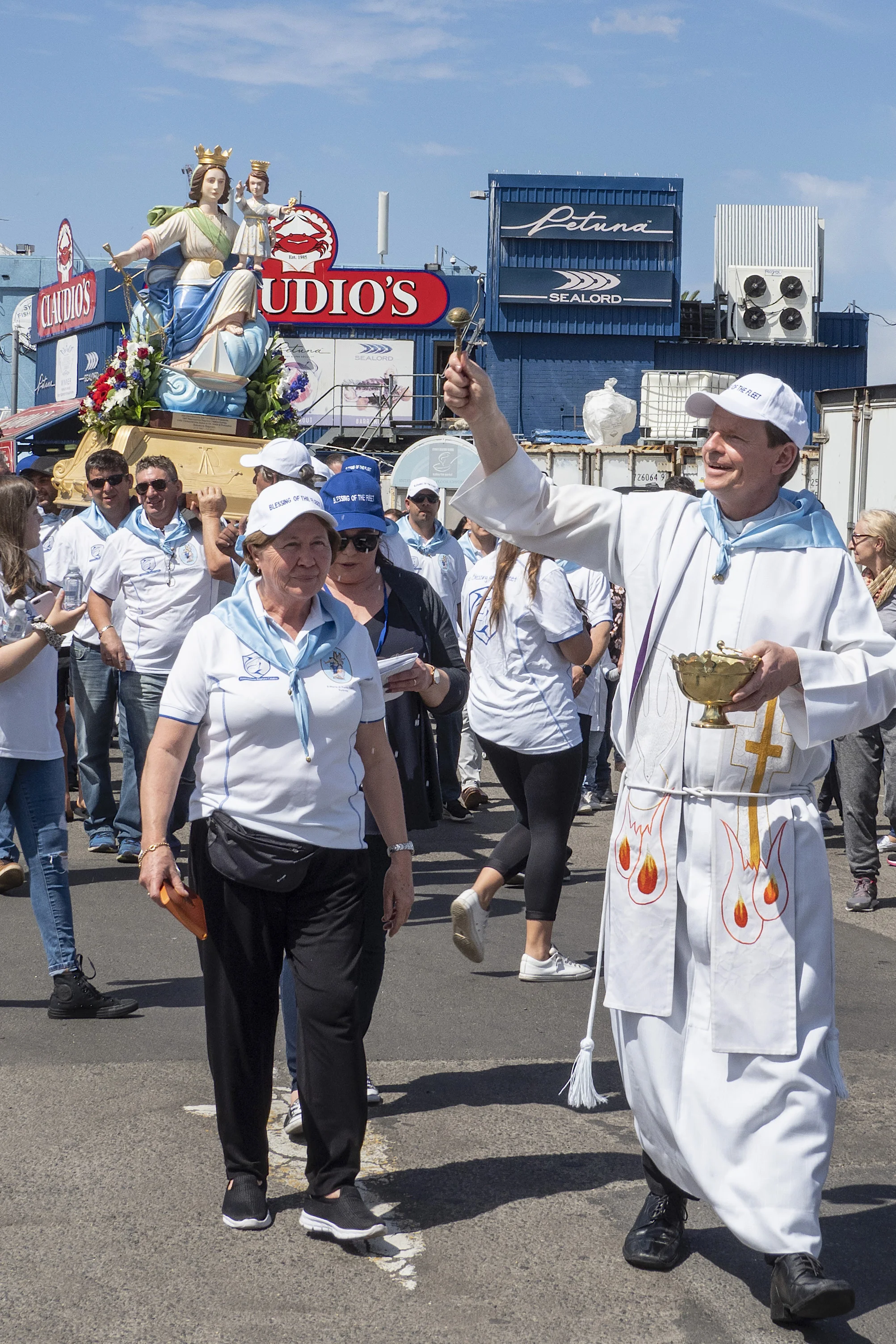 The Priest Leading the Procession