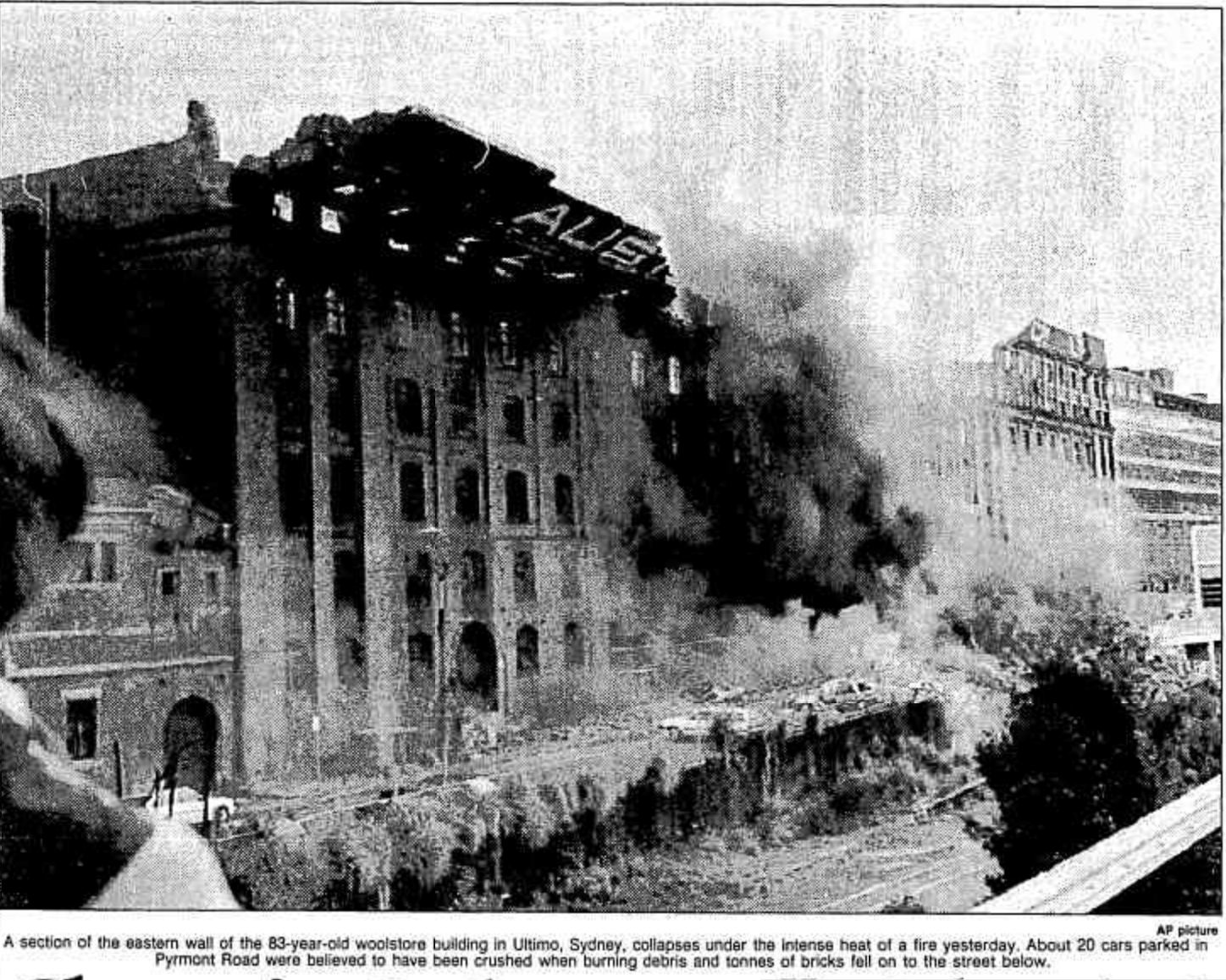 Fire engulfs AML&F wool store 1992.png