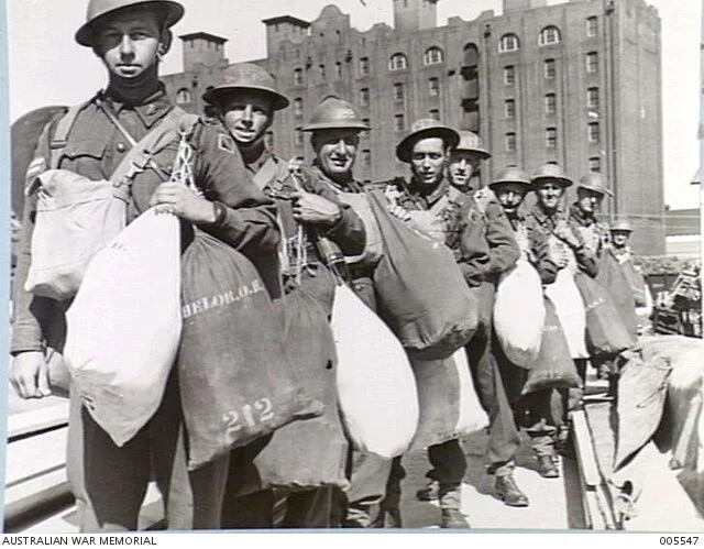 Troops of Mechanised Cavalry regiment of 7th Div. awaiting tranport to Queen Mary for embarkation prior to leaving for the Middle East, 1940