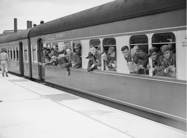 Troops of 7th Division arriving at Pyrmont prior to embarkation on the troop transport Queen Mary for the voyage to the Middle East 1941