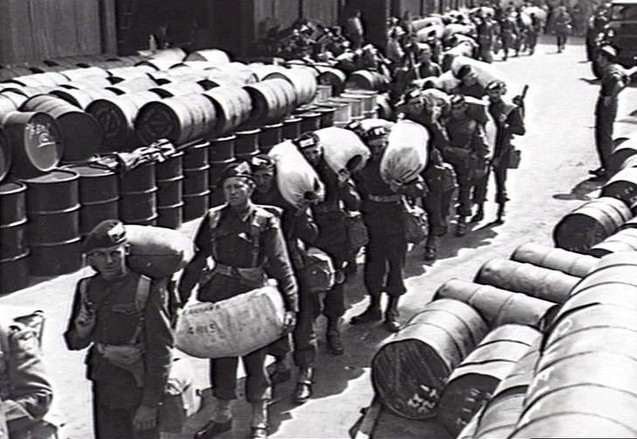 Armoured car personnel waiting to board at Glebe Island 1946